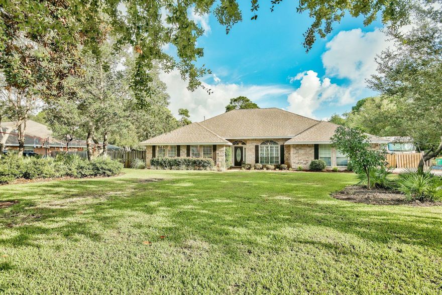 Looking for a stunning, LIKE NEW, Home with a wide-open floor plan, in a fantastic neighborhood, WITHOUT the new Home price? You've found it and it will be love at first sight. Plus NEW HVAC & NEW ROOF to be installed! Dark wood floors contrasted against crisp white walls & high ceilings make an immediate impact! Taking center stage is the remodeled gorgeous all white Kitchen w/15 inch custom cabinets, ''double hidden'' drawers, large island, SS appliances including a Bosch GAS stove, farmer's sink & custom backsplash. A dual gas or wood burning fireplace accents the giant great room which offers several Living & Dining areas, & the 230 SF heated & cooled Florida rm (NOT included in SF) provides a fantastic 2nd Living area. Offering 4 BRs PLUS an office, there's plenty room for everyone. The wood floors continue into the spacious Master bedroom. His & her granite topped Vanity, soaking tub, tiled walk-in shower w/heavy glass doors & his & her walk-in closets accent the Master bath. The spacious Patio w/pavers & strung lights provides a picturesque space for entertaining or relaxing & the large, fenced backyard is private and has plenty of space for a pool.

Other features of this amazing Home include custom plantation shutters, a custom pantry & laundry room, a 3 yr old gas tank less hot water heater, well & sprinkler system w/new timer & 3 yr old pump, side pad for a boat or RV, separate fenced area of yard w/beautiful flowering arbor, multiple apple, orange, peach & fruit cocktail trees, and a community pool just down the street. Nestled in the heart of "Old" Destin on a quiet cul-de-sac, this Home is close to schools, shopping, restaurants and the beach. Act now as this wonderful Home won't be on the market long.