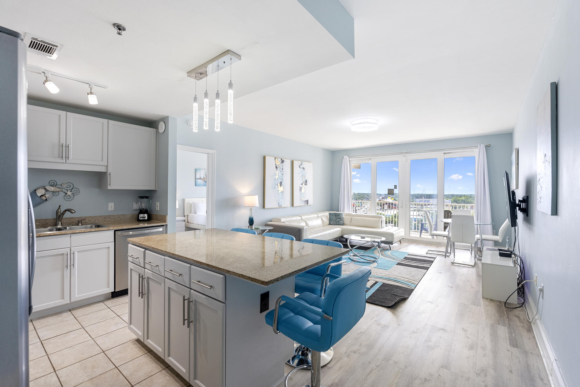 Turnkey and income producing, this beautifully furnished 3-bedroom 2-bath condo at the iconic Laketown Wharf Resort offers a rare opportunity to own in one of Panama City Beach's largest and most amenity rich complexes. Spanning 1,262 square feet, this spacious unit is already on a successful short term rental program and comes fully equipped for immediate use. Just bring your swimsuit.The open concept layout features a granite kitchen, spacious living and dining areas, a private balcony, and a serene primary suite with an en suite bath. The third bedroom includes bunks, maximizing guest capacity for families or groups.Located directly across from the Gulf of Mexico, Laketown Wharf boasts unmatched amenities including five resort style pools, two hot tubs, a fitness center wit with Gulf views, rooftop putting green, on site dining, a candy shop, lakefront boardwalk, and nightly fountain and light shows.
Guests enjoy direct beach access, covered parking, 24 hour security, and proximity to local hotspots like Pineapple Willy's, WonderWorks, and Ripley's Believe It or Not.
Whether you're looking to invest, vacation, or both, this condo is a standout in location, size, and value. Schedule your private tour today before it's gone.