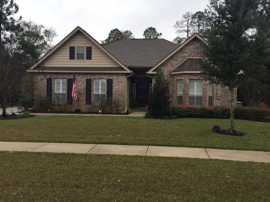 THIS HOME HAS IT ALL AND IS READY FOR OCCUPANCY! 3 BDR,2 BATH W/SUNROOM. LARGE LOT W/PRIVACY -BACKS UP TO THE PRESERVE. LOW MAINTENANCE BRICK EXTERIOR W/SIDE ENTRY GARAGE, HURRICANE PROTECTIVE SHUTTERS, GUTTERS, BEAUTIFULLY LANDSCAPED W/BRICK PAVER PATIO AND A BRICK PAVER CUSTOM FIREPIT AREA IN BACKYARD. INTERIOR HAS MANY UPGRADED FEATURES: LAMINATE WOOD FLOORING THROUGHOUT ALL LIVING/BEDROOMS. TILE FLOORING IN SUNROOM,KIT,DINING,BATHS,LAUNDRY. NO CARPET! SUNROOM HAS FRENCH DOORS AND MODERN WALL MOUNT ELEC FIREPLACE. ALSO INCLUDED ARE GRANITE COUNTERTOPS,CUSTOM PLANTATION SHUTTERS ON ALL WINDOWS,UPGRADED LIGHTING IN ALL ROOMS AND THE MBATH HAS A TILE SHOWER. THE GARAGE FLOOR IS SEALED AND HAS A PULL DOWN LADDER FOR THE ATTIC, WHICH HAS A LARGE FLOORED AREA FOR ADDL STORAGE. A GREAT BUY!
