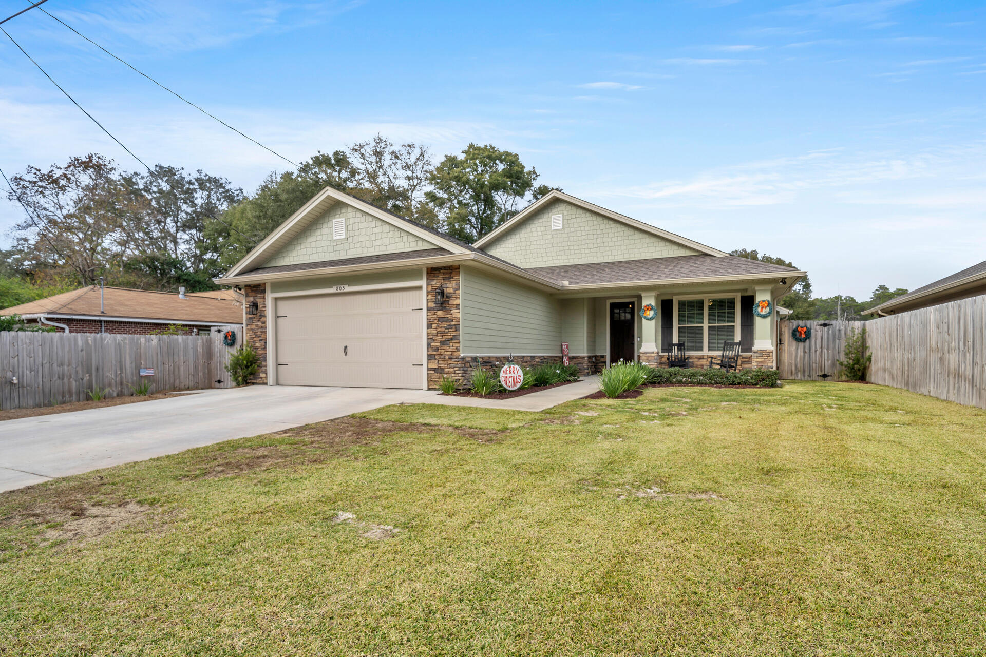SELLER OFFERING $15K TOWARDS RATE BUY-DOWN AND/OR BUYER CLOSING COSTS WITH ACCEPTABLE OFFER. Almost BRAND NEW home located between all three military bases. Close to golf, dining, shopping, beaches and more. Enter through the covered patio, into the foyer with premium vinyl plank flooring to show the elegance of this home. Enjoy the flooring in the foyer, flex room, cafe, and kitchen. Kitchen is great for entertaining with Granite counter tops, breakfast bar, cafe style eat-in area, and opens to the family room. The Master suite offers a gracious walk-in closet, soaking tub, separate shower, & dual spa sinks. Decorative columns, shake siding & stone accent the exterior of the home. Enjoy your morning coffee on the Lanai with a yard that has plenty of room for a pool. Master bedroom has its own door to the back porch/back yard. All dimensions and information herein is deemed reliable, but should be verified by buyer.