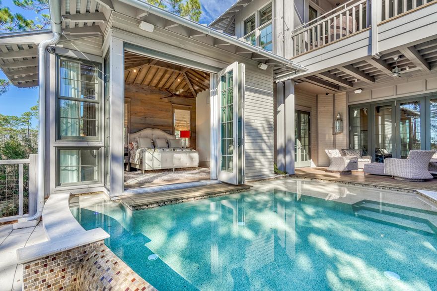 Sweeping, one-of-a-kind views of Western Lake, the Gulf of Mexico and Grayton Beach State Park define this masterpiece collaboration between architect Matt Savoie of Savoie Architects, builder John Brown of Gulfview Construction and designer Karen Waterfield of Sugar Beach Interiors. This 5BR/5.5BA lake front residence with private infinity pool is perfectly positioned to offer a peaceful sense of seclusion yet is nestled in the premier Vermilion Point district of the WaterColor Inn & Resort. Rustic meets 30A with truly unique and memorable interiors meticulously selected and sourced such as red & white oak wide plank reclaimed floors, walnut doors and honed granite countertops. This home is fully handicap accessible with an entry ramp and a commercial elevator that services 3 levels.