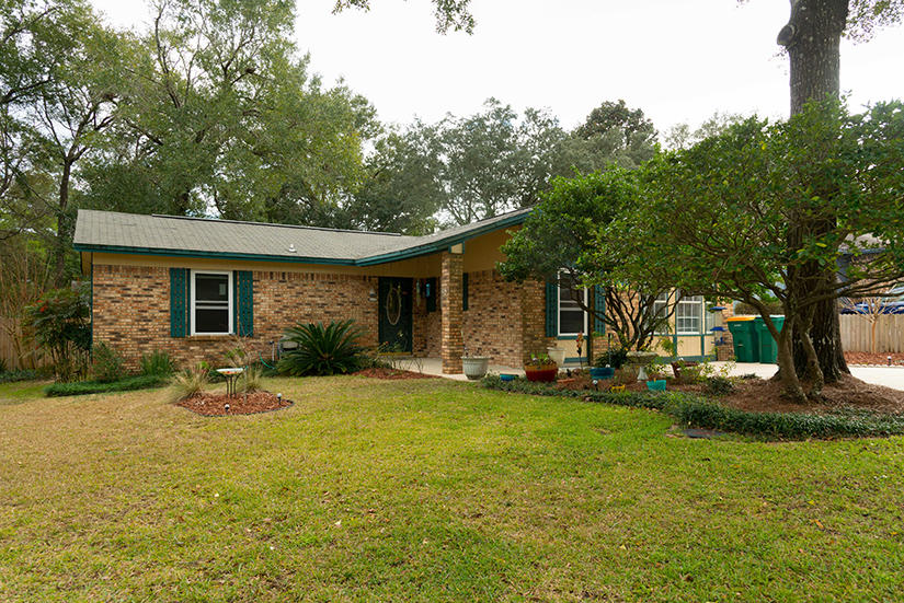 WOW, what a great neighborhood close to everything. Great split bedroom floor plan. Peaceful back yard ready for summer fun with an in-ground 16X32 pool. Home is in ''move-in'' condition. Newly painted interior. Driveway and walkway pressure washed. 4th bedroom/den is the converted garage. Washer/Dryer conveys ''as is''. Pool pump cover just replaced with two years warranty left on pool liner. Large yard building. New energy efficient windows in 2019. Hurricane shutters never used. Kitchen cabinets just painted. Home is like new. Bring your family home. New Screened in porch waiting for you to enjoy your morning coffee.