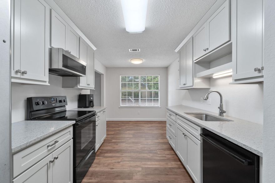 *New Roof in 2021!* Bring your boat and/or RV! Welcome home to this fantastic newly renovated home on a cul-de-sac lot in the popular neighborhood of Country Breeze Estates! Pull up into the oversized driveway and you'll find plenty of room for parking including an extended pad behind the double gate complete with an RV hookup. Inside this brick ranch you'll love the new luxury vinyl plank flooring that extends throughout perfectly finished with new baseboards and door molding. In addition to three bedrooms there's also a flex space perfect for an office or playroom! The gorgeous kitchen has been renovated with all new cabinets, undermount sink, and granite counters and is finished with stainless appliances, an eat in kitchen space, and pantry. Appreciate updated light