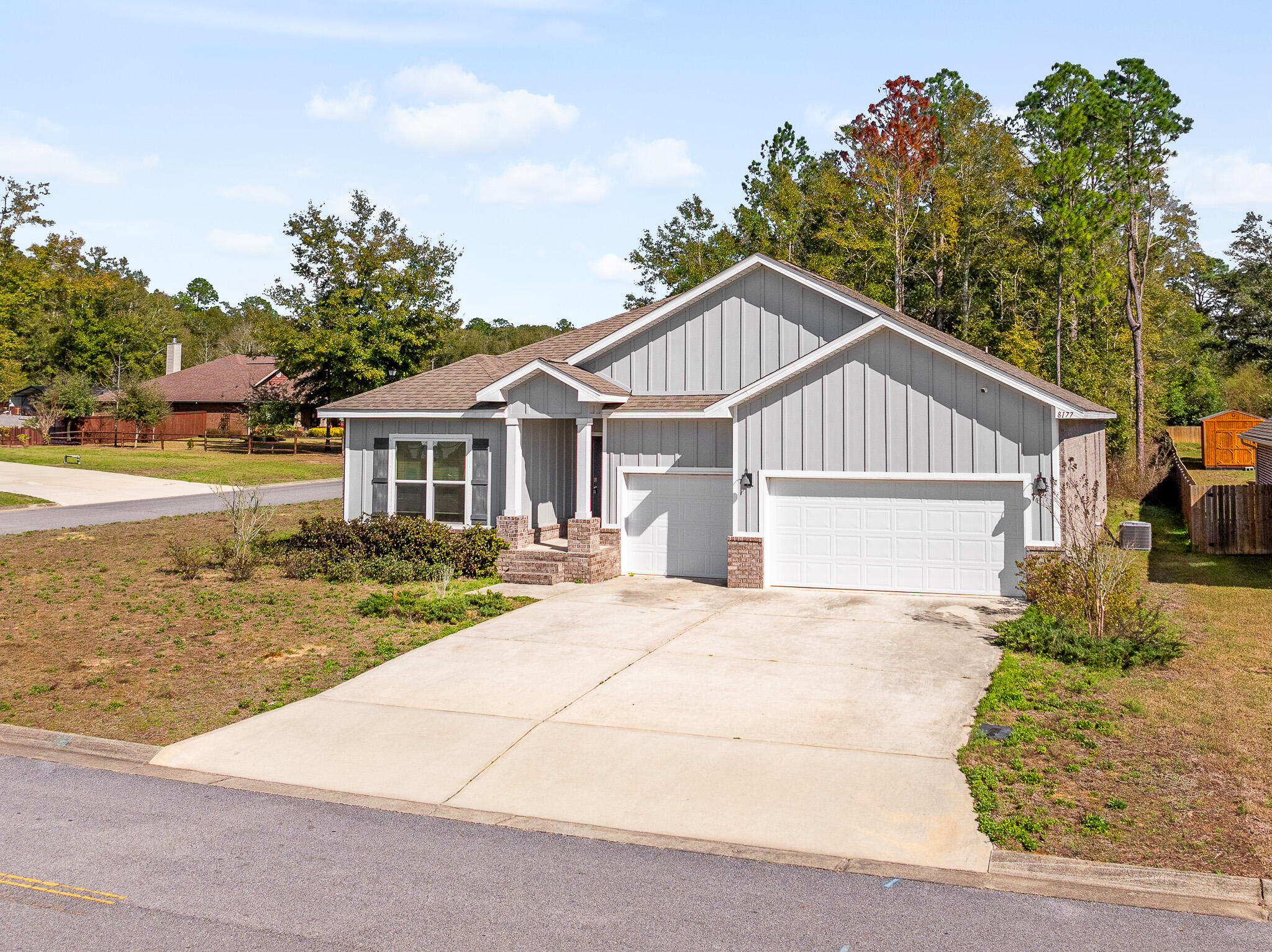 Welcome to 8177 Majestic Cypress Dr, a beautifully maintained and spacious home on a corner lot over half an acre in Milton, FL. Nestled among mature trees, this property offers endless possibilities, with plenty of space to add a pool, garden, storage shed, or even room for a boat or RV if cleared.Boasting over 2,800 sq ft of living space, this home features 4 bedrooms, 4 bathrooms, a flexible bonus room, and a 3-car garage. The bonus room is ideal for a mother-in-law suite, home office, gym, or playroom, whatever fits your lifestyle.The open-concept layout includes a large kitchen with granite countertops, stainless steel appliances, a walk-in pantry, and an oversized island perfect for gatherings. The primary suite offers a peaceful retreat with a garden tub, separate walk-in shower, double vanity, and spacious walk-in closet.
Additional highlights include a Jack & Jill bedroom setup, fresh interior paint, a huge laundry room, security system, and a fully resodded yard (in progress).
Located in a desirable HOA community with convenient access to I-10 and Whiting Field, this home offers both space and comfort with room to grow.