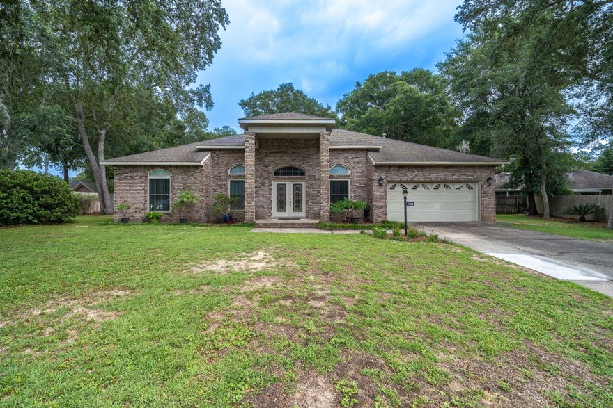 Welcome to Plantation Oaks! Located in a cul-de-sac in THE ideal neighborhood in South Crestview providing access to all the bases; this custom home has plenty of space with a huge detached garage/workshop, fenced in backyard wonderland and a private pool all on nearly a half acre! Pull up into the oversized long driveway and feel invited in by the covered front porch. Enter through the doors to uncover vaulted ceilings, scratch resistant bamboo flooring throughout, a formal dining room, additional office/work space. The master bedroom is large with the ensuite and a huge walk in closet. This one of a kind house, in a beautiful established neighborhood with no HOA fees, and with plenty of storage opportunities on the very southern tip of town, makes it like no other.