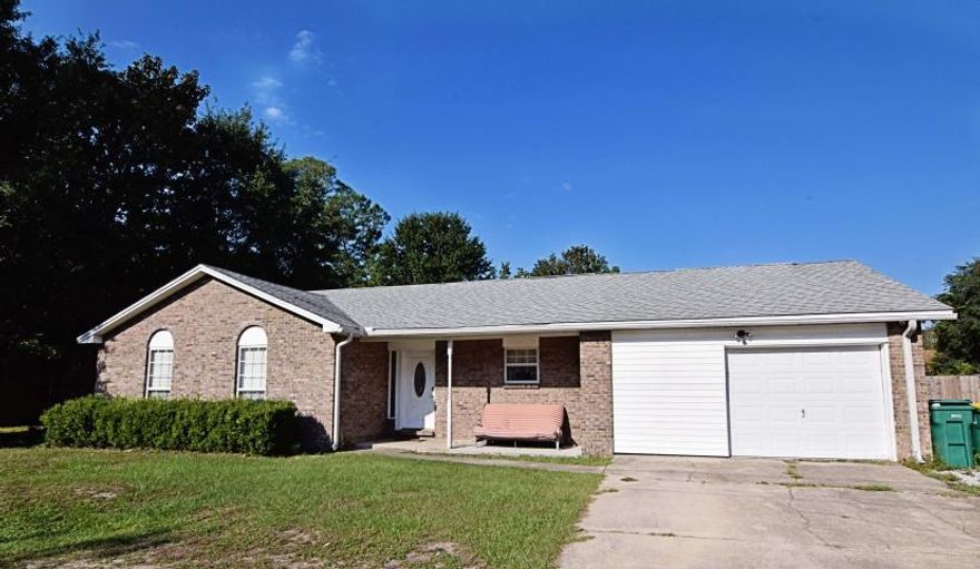 Bank approved short sale. This home offers the convenience of living in town but has much more space than the usual small lots. With 5 bedrooms built on two lots with over 1/3 of an acre, there is a lot of potential in this home. Two large separate living areas offer the adults and kids both plenty of room, or you can finally fit the pool table in the house! The yard is fully fenced with room for a pool. The 24 x 30 detached 2 car garage has plenty of space for workshop or car repair. Parking for your RV, boat or extra cars is not a problem. Some work needs to be done, but a buyer willing to do that will be rewarded. Recent appraisal at $253,300.