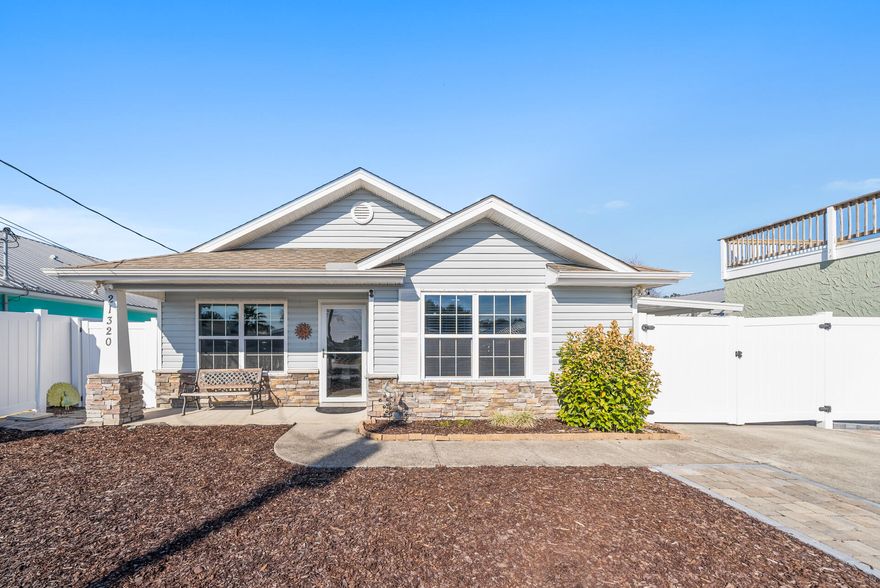Welcome to this updated 3-bedroom, 2-bath beach house located in the highly sought-after Riviera Beach neighborhood on the west end of Panama City Beach. A perfect coastal retreat, this home is only a short 4-block ride by golf cart to dedicated beach access, ensuring your easy access to the pristine shores of the Gulf. This is one of the last neighborhoods in the area where the charm and privacy are preserved, offering a unique opportunity to enjoy the beauty of the beach without the crowds.Inside, the home boasts a bright and open floor plan with tile throughout, ideal for easy cleanup after a fun day in the sun or sand. The contiguous granite countertops in the kitchen and bathrooms provide both elegance and durability, while the spacious living areas are perfect for gathering family and friends. The main living space flows seamlessly into the kitchen, making entertaining a breeze.

The primary bedroom suite is a true retreat, featuring a beautiful tray ceiling and French doors that open directly to the redesigned backyard, allowing you to enjoy the beautiful Florida sunshine at any time. The en suite bath offers a walk-in shower for added ease.

The home's backyard has been thoughtfully redesigned to offer both beauty and functionality. The landscaping is easy to maintain, so you won't have to worry about regular upkeep. With no monthly lawn maintenance required, you can focus on enjoying the outdoor spaces. The covered carport, behind a privacy fence, can be used for covered parking, or it could be transformed into a comfortable outdoor living space by adding seating or a tableimagine dining or relaxing while taking in the fresh air and coastal breeze.

In addition to the carport, the property features a newly installed outdoor shower, ideal for rinsing off after a day at the beach. The back yard has also been freshly graded, with new pavers and landscaping designed to maximize the outdoor living area. It's an ideal space for hosting gatherings or enjoying peaceful evenings.

For added convenience, there's a storage shed that can be used as an ''owners closet''perfect for keeping personal items out of reach of guests. The home also offers designated parking for 6-8 vehicles, providing ample space for family, friends, and visitors to park comfortably.

This home comes equipped with hurricane panels, offering additional peace of mind during storm season. And with its prime location, you'll be just a short drive to the coveted 30A corridor, where you can explore boutique shops, restaurants, and scenic views. Pier Park, a popular shopping and entertainment destination, is also nearby, making this beach house ideally situated for convenience while still maintaining a quieter, more relaxed vibe on the west end of Panama City Beach.

Whether you're looking for a permanent residence, a second home, or a vacation rental investment, this beach house offers the perfect combination of comfort, style, and location. Don't miss out on this rare opportunity to own a piece of paradise on one of the most desirable stretches of beach in Panama City Beach.