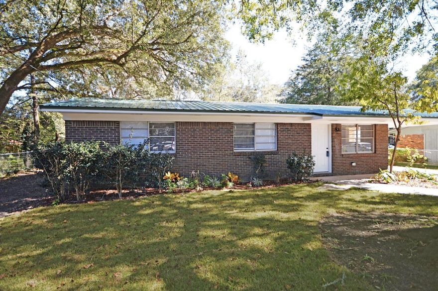 4 BEDROOM, 3 BATHROOM IN CRESTVIEW WITH MUST-SEE UPGRADES!I'll spoil the surprise early, 2 of the 4 bedrooms are master suites!Entering your new home, note the newly renovated open floor plan of the living areas. A carpeted living room gives way to an open kitchen and dining room. The flooring transitions to a stylish and modern upgrade. The kitchen features new granite countertops with a pattern that accents the white subway tile backsplash, new cabinets and new flooring. At the back of the home is the first master suite (that's right, there are 2 master suites!). If the spacious master suite with walk-in closet and newly tiled archway shower weren't enough, this room features access to the driveway and carport.