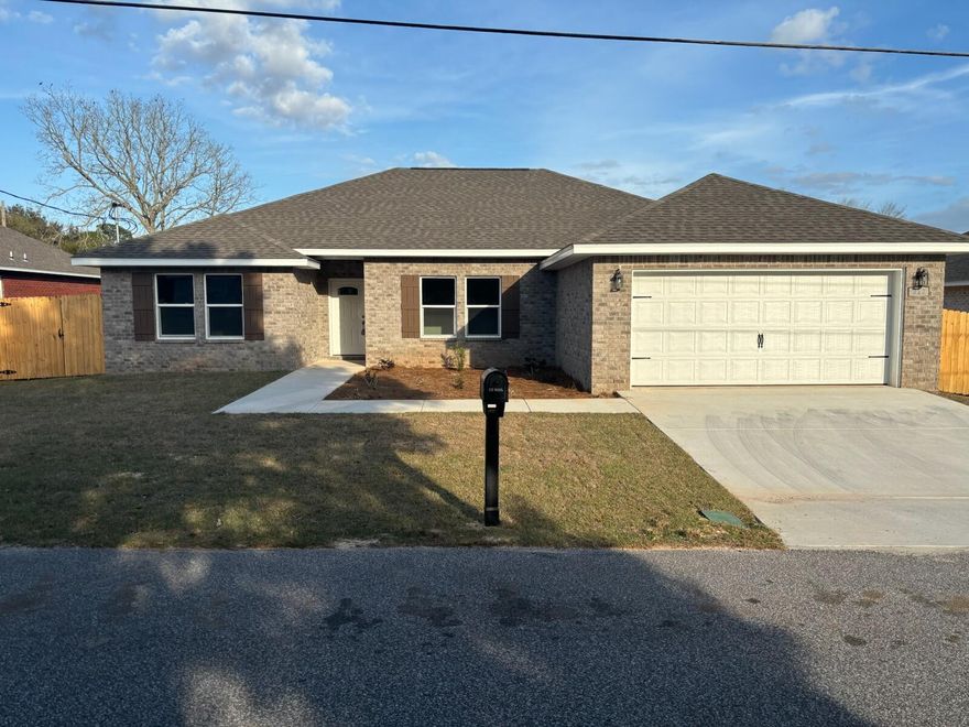 SELLER WILL CONTRIBUTE UP TO $10K TOWARDS POINT BUY DOWN OR CLOSING ASSITANCE. NEW CONSTRUCTION. READY TO MOVE IN. STAR QUALITY, ALL BRICK, 4 BR. 2 BA. AN ARRAY OF SPECIAL FEATURES! 75' FLAT SCREEN TV, 70' ELECTRIC FIREPLACE, RECESSED BUILT-IN NOOKS, LIVING/GREAT ROOM, DINING AREA, 9 AND 10 FOOT CEILINGS W/CROWN MOLDING. LIVING/GREAT ROOM AND MAIN BR HAVE TRAY CEILINGS ACCENTED WITH RECESSED LIGHTING. NICE SIZED BEDROOMS. CEILING FANS IN ADDITIONAL ROOMS! FULLY LOADED GALLEY KITCHEN EQUIPPED W/UPGRADED STAINLESS STEEL KITCHEN APPLIANCE PACKAGE. CUSTOM BUILT WHITE CABINETS, GRANITE COUNTERTOPS, LVP FLOORING THRU-OUT, WALL PAINT COLOR - REPOSE GRAY,  EPOXY FLOORING IN GARAGE. PHOTOS ARE SAMPLES ONLY. $1600 Lender Credit if you choose to use our preferred lender.
