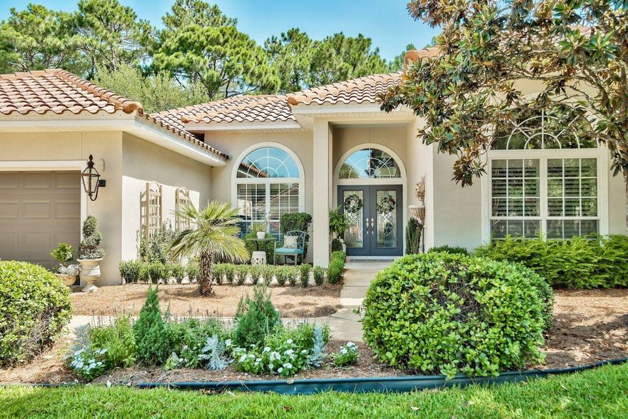 A touch of Spanish, a hint of Old World and a big splash of Florida combine for a gracious lifestyle in the Emerald Bay gated golf community. An appealing street presence, interior archways, angled walls, coffered ceilings, and crown molding raise the bar on architectural style. The large open kitchen sparkles with stainless steel appliances including a gas range, plus spacious granite counters, breakfast or wine bar, custom cabinets and a horizontal glass backsplash. Glamour and luxury abound in the master bedroom suite, which opens to the pool and patio, and features a whirlpool tub and dual vanities. Two guest rooms and two more full baths plus a powder room offer privacy for family and guests.