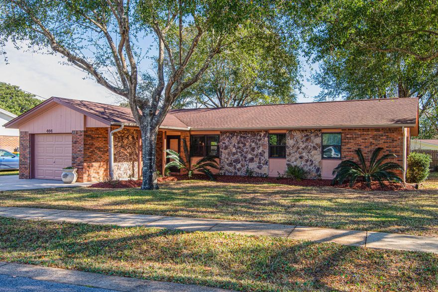 Beautifully Remodeled Home, Great Location In Destin. Meticulously Maintained Inside & Out. Modern Open Concept For LR, Kitchen, & Dining Areas. Granite Counters w/ Island & Workspace in Large Kitchen. Stainless Style Kitchen Appliances Stay! Rock Fireplace in LR & Lofted Ceiling Opens Up Area. Upgraded Slider Door From Kitchen To Outdoor Paver Patio & Awesome Back Yard. Hallway Leads To Large Master Bedroom. Updated Master Bathroom w/ Granite Vanity, Upgraded Lights & Plumbing Fixtures. Guest BR In Corner Location w/ Multiple Windows & Nice Sized Closet. 3rd BR Used As Study/TV Room. Guest Bathroom w/ Tile Floors, Updated Fixtures, & Stack Storage. Nice Garage For Auto + Oversized Driveway For Parking. Fenced Backyard w/ Storage Shed, & Paver Parking Area. Call Today Before Its Too Late