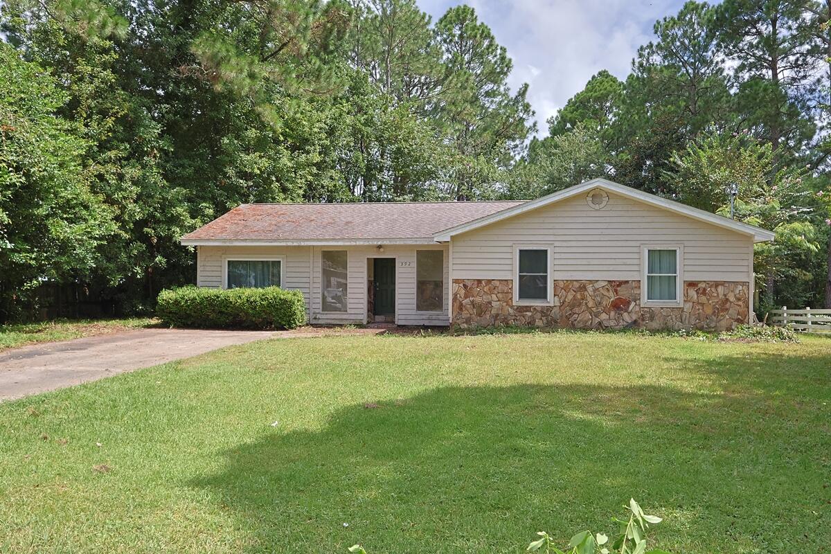 Over 1/3 acre with a pond just 6 miles west of Hurlburt Field! This 4-bedroom, 2.5-bath, 2,186 sq ft home is tucked into a quiet residential neighborhood and offers space, privacy, and flexibility. Pictures are coming soon. The large lot includes a powered outbuilding once used as a studio, plus room for a boat or RV trailer. Split floor plan features a primary suite off the family room and three guest bedrooms on the opposite side--one with its own half bath, perfect for guests or extended family. Kitchen has granite counters and modern LED lighting. Florida room adds bonus living space. Roof approx. 5 years old. Home needs updating and is priced accordingly. Buyer to verify all pertinent measurements. No HOA.
