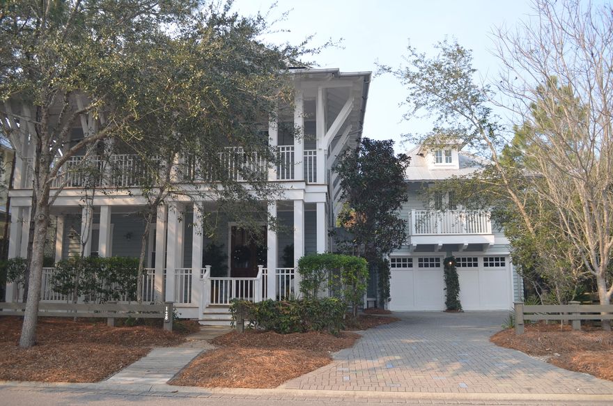 Looking for that house that has a primary residence feel, but with great rental potential? Then put this home on your must see list. 2 car garage and carriage house, this large lot backs up to Western Lake for privacy. Expansive decks and welcoming porches beckon you for that morning cup of coffee. 3 large bedrooms and a bunk room in the main house, each with private baths giving everyone space. The open living/dining room is great for entertaining and family gatherings. The gourmet kitchen has professional stainless appliances, including a sub-zero refrigerator and Wolf Range. 2 new A/C units were installed July, 2016. This home has never been a rental, and it shows. It is hard to find this much home at this price in Watercolor. This home has the advantage of being near Camp Watercolor,