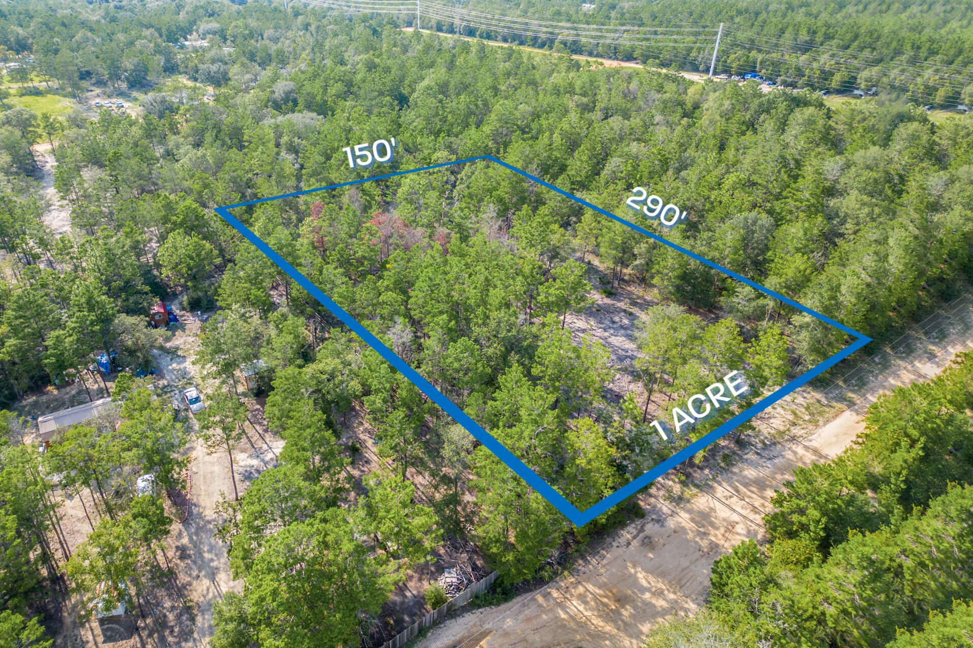 1-Acre Vacant Lot - Partially Cleared, High and Dry, Non-Flood Zone, with a current Survey.. GREAT LOCATION!  Mobile homes are allowed with No HOA Fees!  This spacious lot offers convenient access to major highways (1087, I-10, 285, and 331) and is 0.6 miles from HWY 90. Less than 1/2 mile away from a Dollar General Store and Market and  13 miles from hardware and main grocery stores, schools, downtown, and the captivating historic Lake of DeFuniak. Nature enthusiasts will be thrilled to discover the abundance of outdoor activities nearby, including fishing, golfing, national parks, and the stunning beaches of the Emerald Coast. Additionally, this property is situated near popular cities like Niceville, Crestview, Destin, Florida, 30A/Seaside, and Panama City Beach. There are no utilities in place. Power: Available in the area. Water: requires a private well. Sewer: requires Septic. 

Claim your piece of Florida land!  

GPS location:
https://goo.gl/maps/hJcuPax92JTS4yqS8
