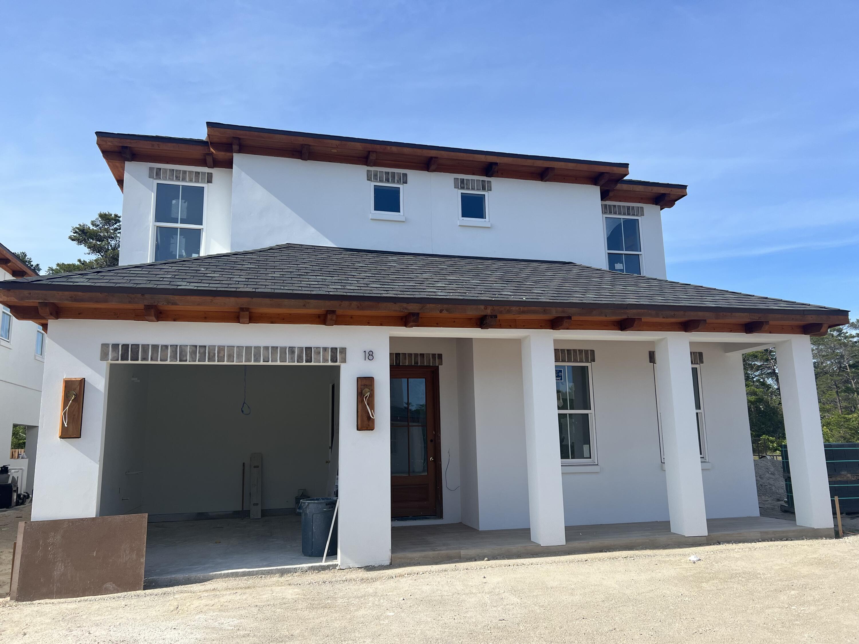 This beautiful New 4 bedroom house has tons of upgrades. 1 car garage, hardwood and tile floors, custom tile shower, standing soaker tub, shiplap on the walls, custom tile showers, 66in Fridge/Freezer, stainless steel appliances, Gas Navien tankless water heater. 2 Living rooms, Bunk Room , Fabulous Balcony. Private pool outdoor kitchen area. This is a 10 home subdivision just minutes away from the beach and near Gulf Place Center, great restaurants, shops, and golf.