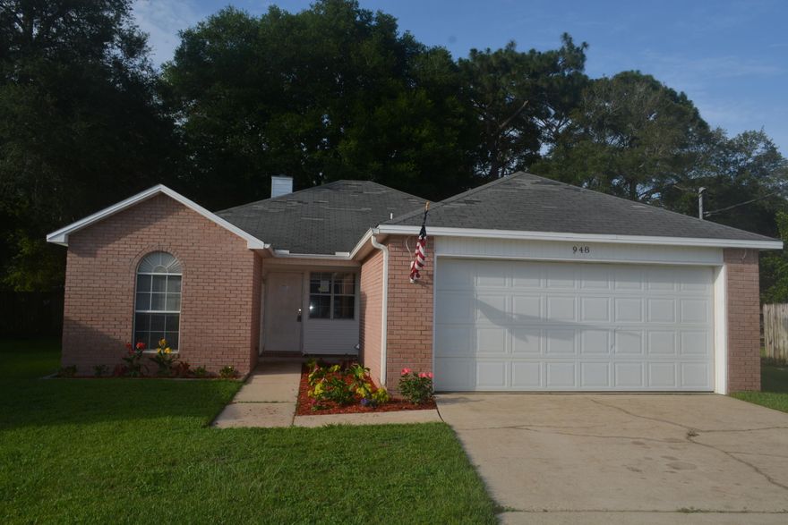 This home has largest lot in this quiet, friendly neighborhood. Close to both bases, and conveinent to shopping and beaches. Large privacy fenced back yard. Well pump and timer for lawn. Wood burning fireplace. Trayed ceiling in family room. Spacious kitchen with pantry. Laundry in garage. Double vanities in master bath. Double paned windows. Screen Porch. Call for more details.