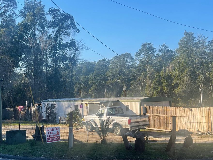 Over 5 acres, great location- near the city and shopping. There is a 3 bedroom 2 bath mobile home on the property that is currently rented. Plenty of privacy. No value given to the mobile home. Must be cash or conventional loans only! Schedule your tour today! All measurements must be verified by buyer. More pictures coming soon!