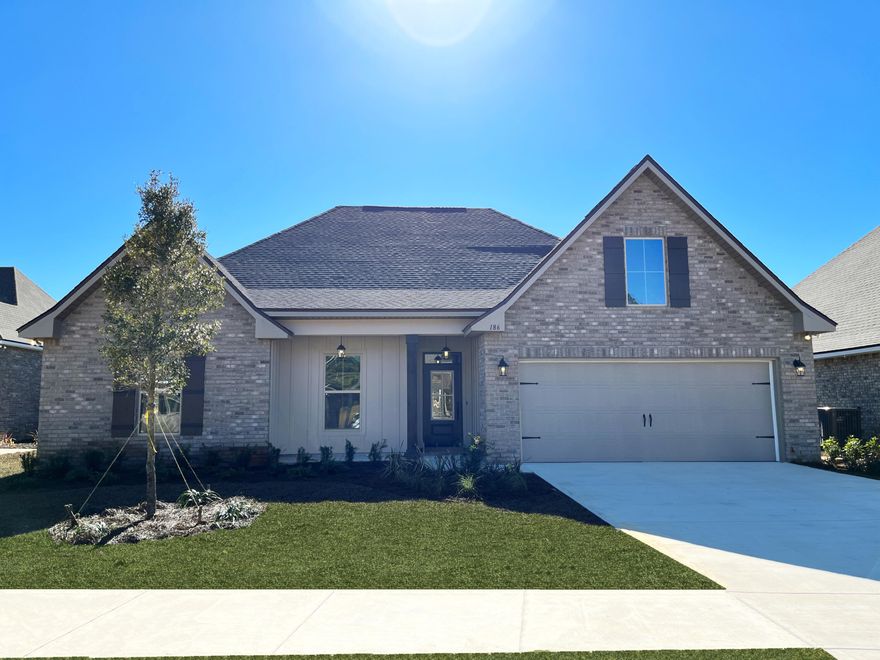 The CAMELLIA IV H in The Trails at Hammock Bay community offers a 4 bedroom, 2 full bathroom, open and split design. Upgrades added (list attached).Special Features: double vanity, garden tub, separate custom tiled shower, and walk-in closet in master bath, kitchen island, walk-in pantry, boot bench in mud room, covered porch & patio, recessed can lighting, undermount sinks, custom backsplash in kitchen, ceiling fans in the living room and master are standard, bronze plumbing fixtures, framed mirrors, smoke & carbon monoxide detectors, automatic garage door with 2 remotes, landscaping, architectural 30-year shingles, and more!Energy Efficient Features: tankless gas water heater, kitchen appliance package with gas range & more!