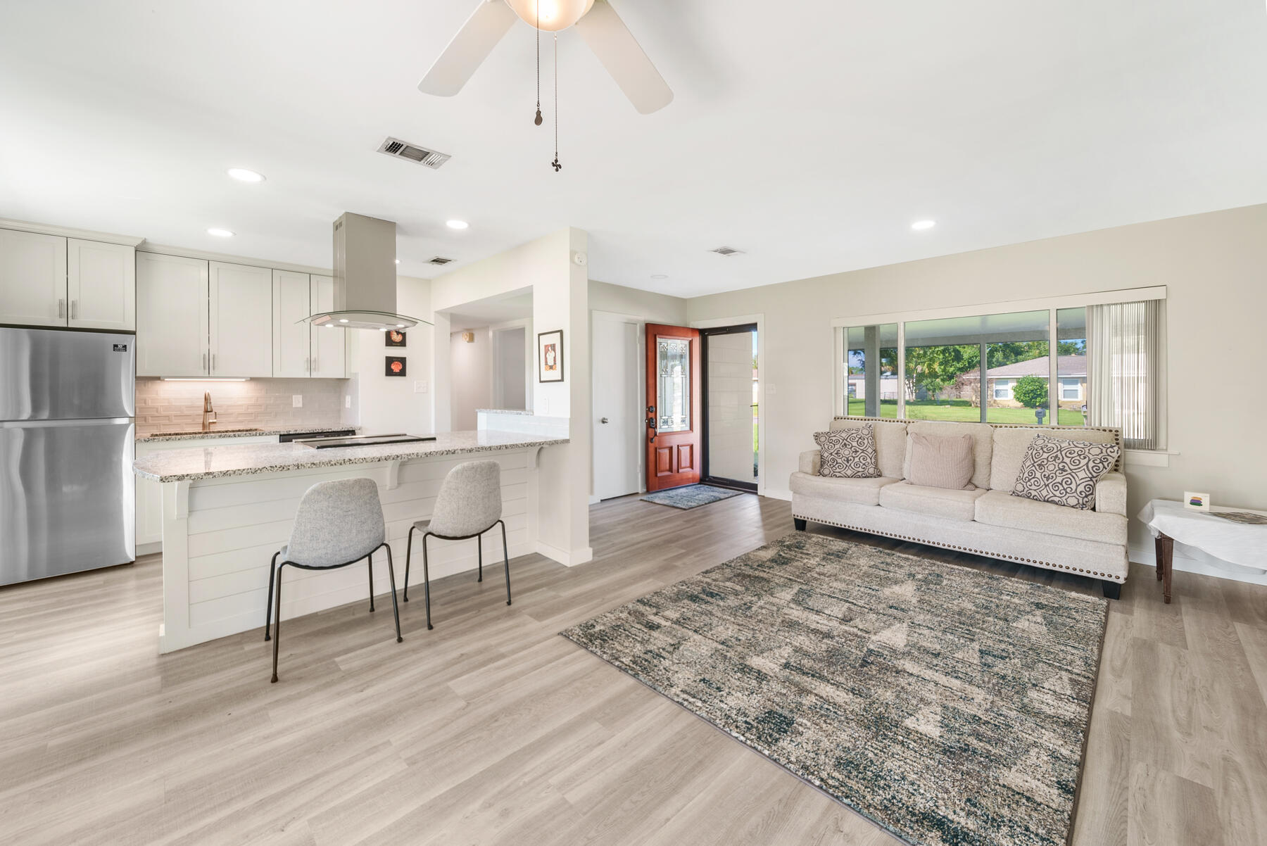 Back on market--No fault of seller! Beautifully remodeled Lynn Haven home offers the perfect blend of modern elegance, functionality, and energy-efficient living. Step inside to an open, sunlit floor plan with luxury vinyl plank flooring and a neutral, coastal-inspired palette. The kitchen features granite countertops, sleek cabinetry with convenient pullouts, a beautiful island, and a never-used hood vent 2025. Brand new electrical panel installed in 2025 for added peace of mind and lower insurance premiums. Outdoors, enjoy new front and back porch awnings, epoxy-coated concrete pads, and a large yard with space for family fun, a pool, or future ADU/mother-in-law suite. Additional highlights include an insulated garage and laundry area, tiled shower, and upgraded finishes throughout. lower insurance premiums and added protection.
Step outside to discover your new outdoor living retreat. Enjoy the shade under the brand-new front and back porch awnings, complemented by epoxy-coated porches that are both stylish and durable. This expansive lot offers plenty of space for a future pool or an Additional Dwelling Unit (ADU), perfect for guests, in-law suite, parental living or rental income.
Retreat to the modern bathroom, featuring high-end finishes and a beautifully designed tile shower, ensuring a spa-like experience at home. Additional highlights include luxury vinyl plank flooring throughout, an insulated garage and laundry area for added comfort, and a fresh coat of paint inside and out.
This home is not just about aesthetics; it's designed for a sustainable lifestyle with energy-efficient features that help reduce your utility bills. Plus, furnishings are available, making this home truly move-in ready!
Don't miss this incredible opportunity to own a piece of Florida paradise. Schedule your showing today and experience the perfect blend of modern living and outdoor bliss!