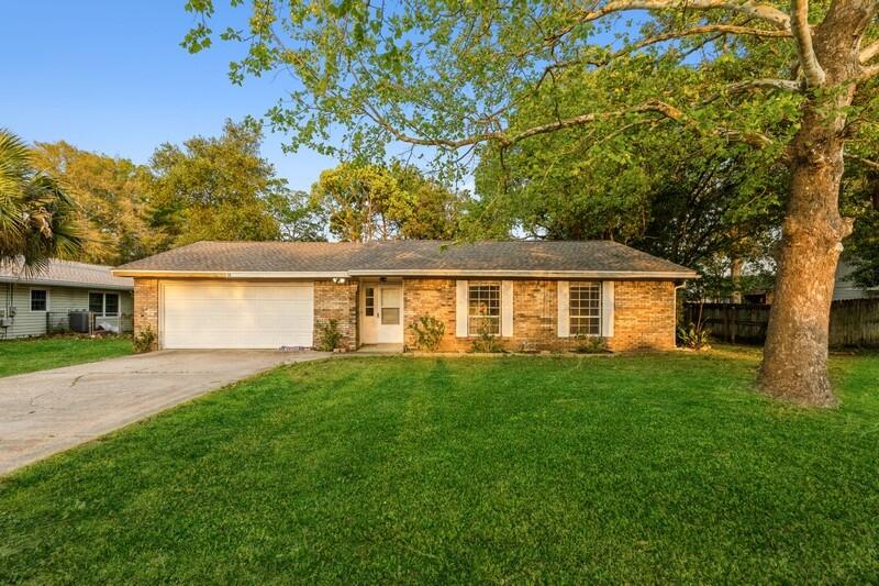 Charming home in Shalimar features a new roof, large screened in porch, 3 bedrooms, 2 full baths and a 2 car garage. Spacious floor plan with vaulted ceilings in the living room which opens upt to the eat in kitchen with updated cabinets and nice breakfast bar. Guest bathroom has been renovated. Conveniently located near Eglin and Hurlburt AFB. Property is being sold as-is. New Roof 2021, HVAC is 2012.**Mulitple offers, highest and best due 4/14 at noon.
