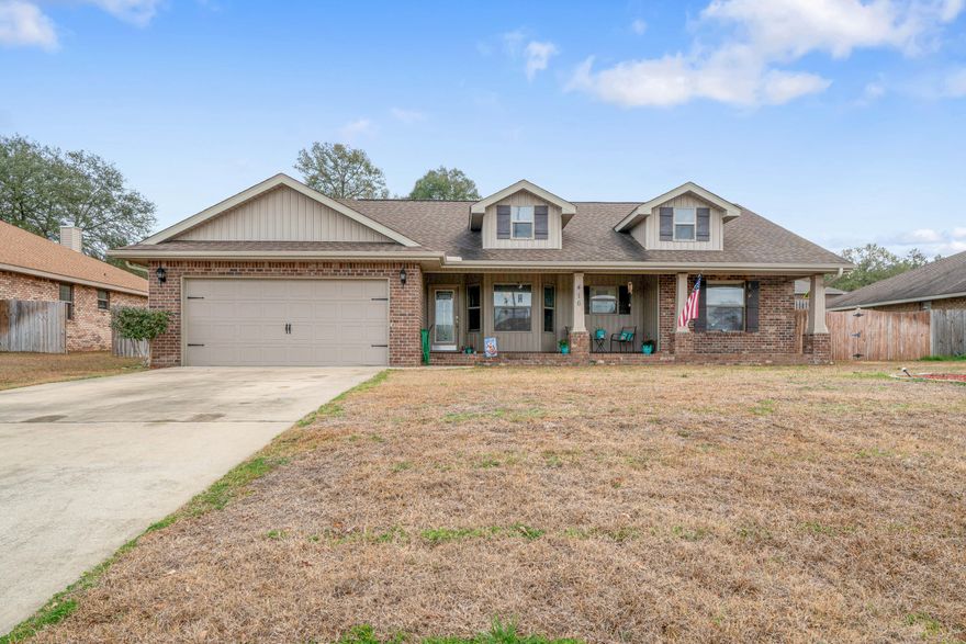 A must see country style home! As soon as you drive up, this home will captivate you with its beautiful country front porch. Upon entry, you're sure to love the open floor plan with wood laminate flooring in the family room and the tile that flows so perfectly into the eat-in kitchen area. There is a lovely tile backsplash that complements the granite countertops perfectly! A bonus feature is the pull out spice rack next to the fridge. The breakfast bar seats four people comfortably and opens into the living room. Wonderful for entertaining! Both bathrooms have tile flooring and granite counter tops as well. The bedrooms are very spacious and carpeted. Additionally, the master closet has built in storage. Let's not forget about the huge back yard for various activities.