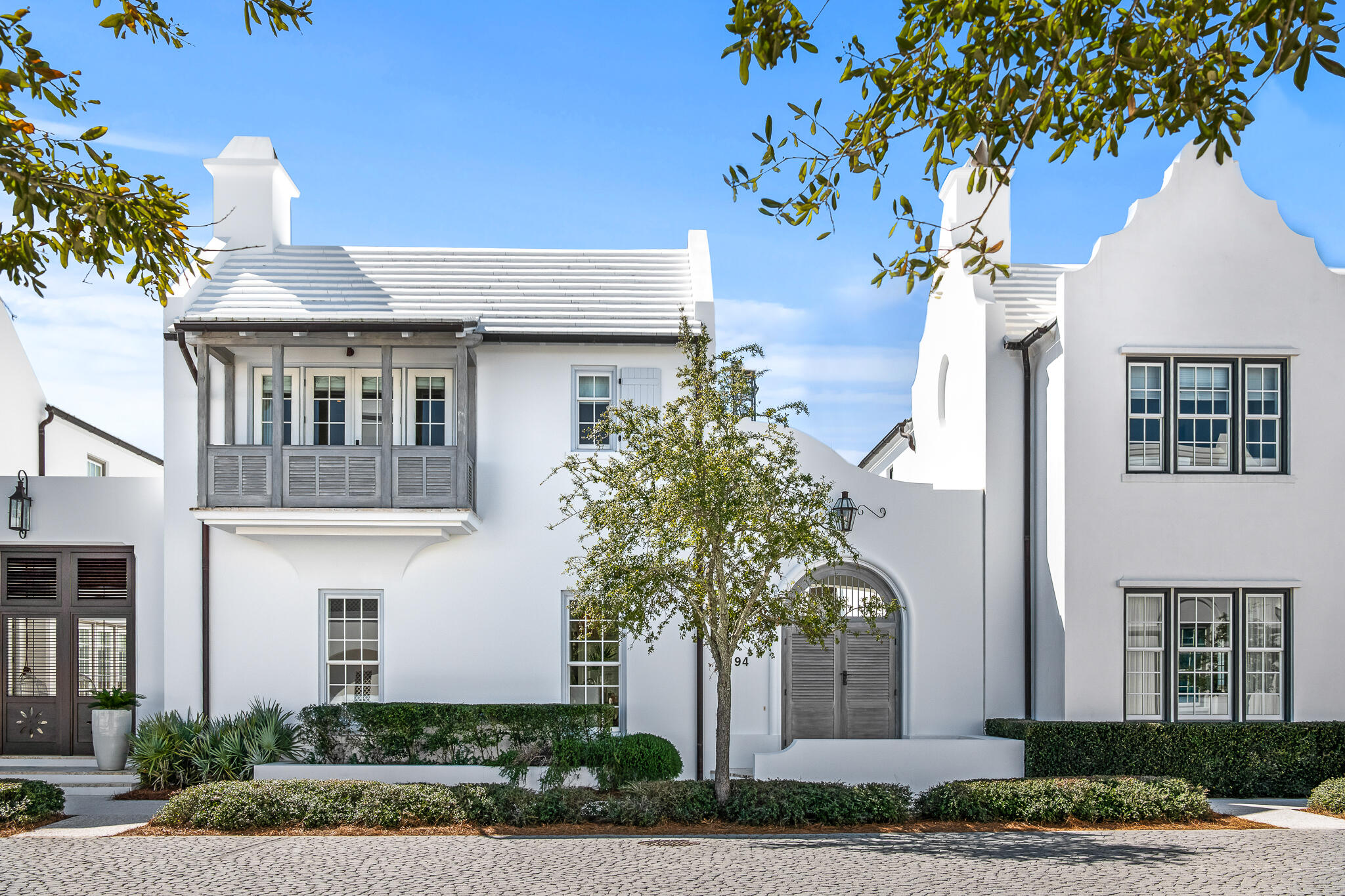 This four bedroom plus bunk room Alys Beach home embodies the best of Alys Beach. Primely located fronting the highly desired street of Nonesuch Way conveniently places this house amongst Caliza Pool & Restaurant, Arboleda Park, Zuma Wellness Center and the Town Center of Alys Beach. The Gary Justiss design delivers two master suites, an open kitchen/living/dining, a wood burning fireplace, a generous courtyard with private pool and covered loggia, and two car garage. Professionally designed interior furnishings are by the Musso Design Group.