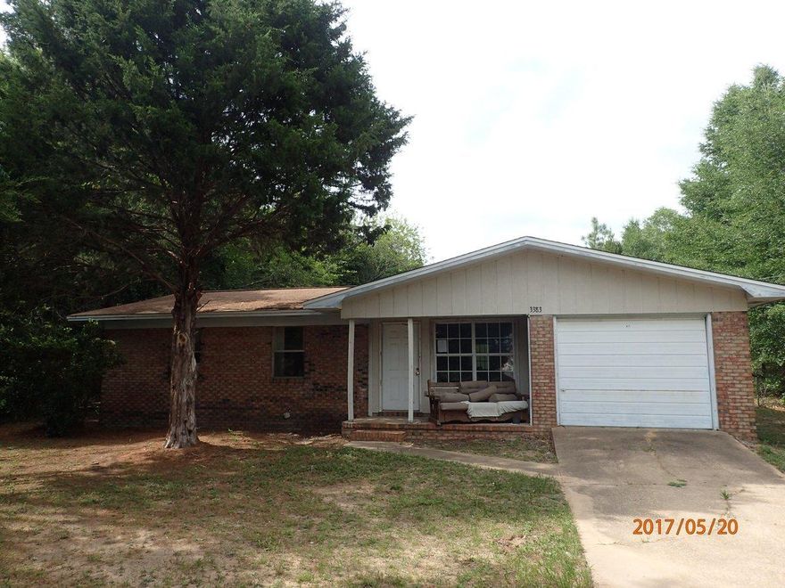 This REO home is just under 1000sf and sits on right at 1/2 acre. Home has brick exterior, 1 car garage and fenced back yard. Inside home has 3 bedrooms and 1 and 1/2 baths. Property needs repairs and will not qualify for most all financing. Call today to view this property.