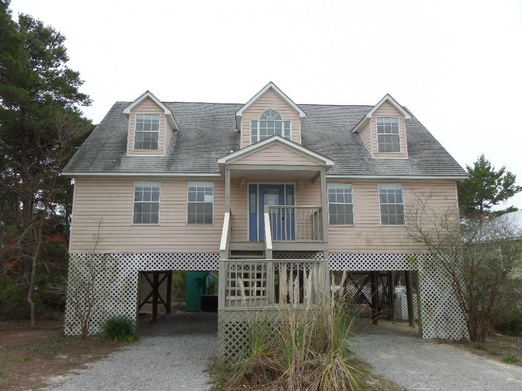 Location! Location! Location! Come see this great 4 bedroom 4 bath 1,820 home just one block North of Hwy 30A!! This 2 story beach home on stilts has loads of nice features including: fenced in- ground pool, open bright living area, 2nd floor sitting area, master on the main level, balcony, outdoor shower, large carport and more! This home is in a great location with quick access to both, Hwy 98 and Hwy 30A. Head North for shopping, schools, hospital, dining, and entertainment OR take a short walk South just a few blocks to the beach!! If you have been dreaming of relaxing in your house by the beach, look no further.... this is it!