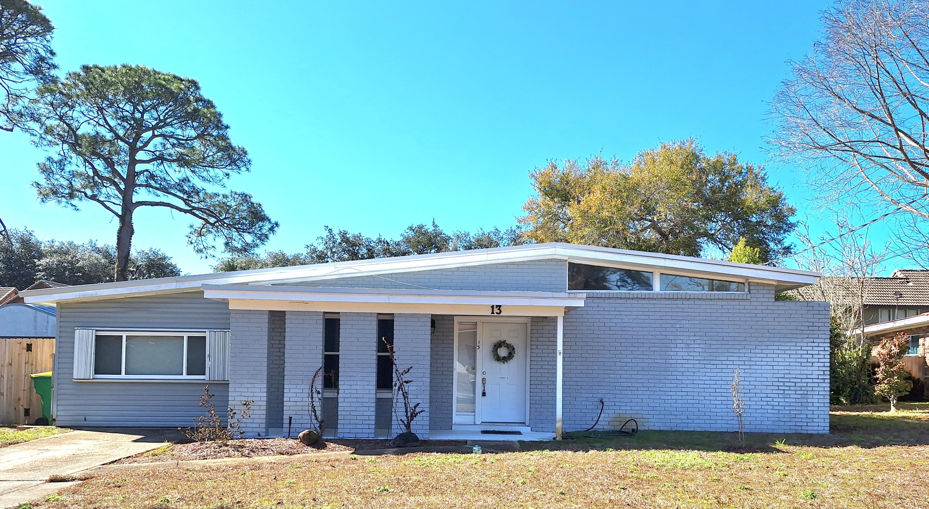 ASSUMABLE VA LOAN WITH A GREAT RATE!!! Welcome to this beautifully appointed 3-bedroom, 2-bath home, ideally situated just moments away from the beach and Hurlburt Field. This property features a spacious layout with ceramic tile flooring in main living areas, offering both durability and elegance.Enjoy the tranquility of a screened porch, perfect for relaxing evenings, while a privacy fence ensures your outdoor space remains a serene retreat. Additionally, a storage building provides ample space for all your organizational needs.Located conveniently near schools, shopping, and recreational opportunities, this home offers a blend of comfort and accessibility, making it an ideal choice for families or those seeking a coastal lifestyle.