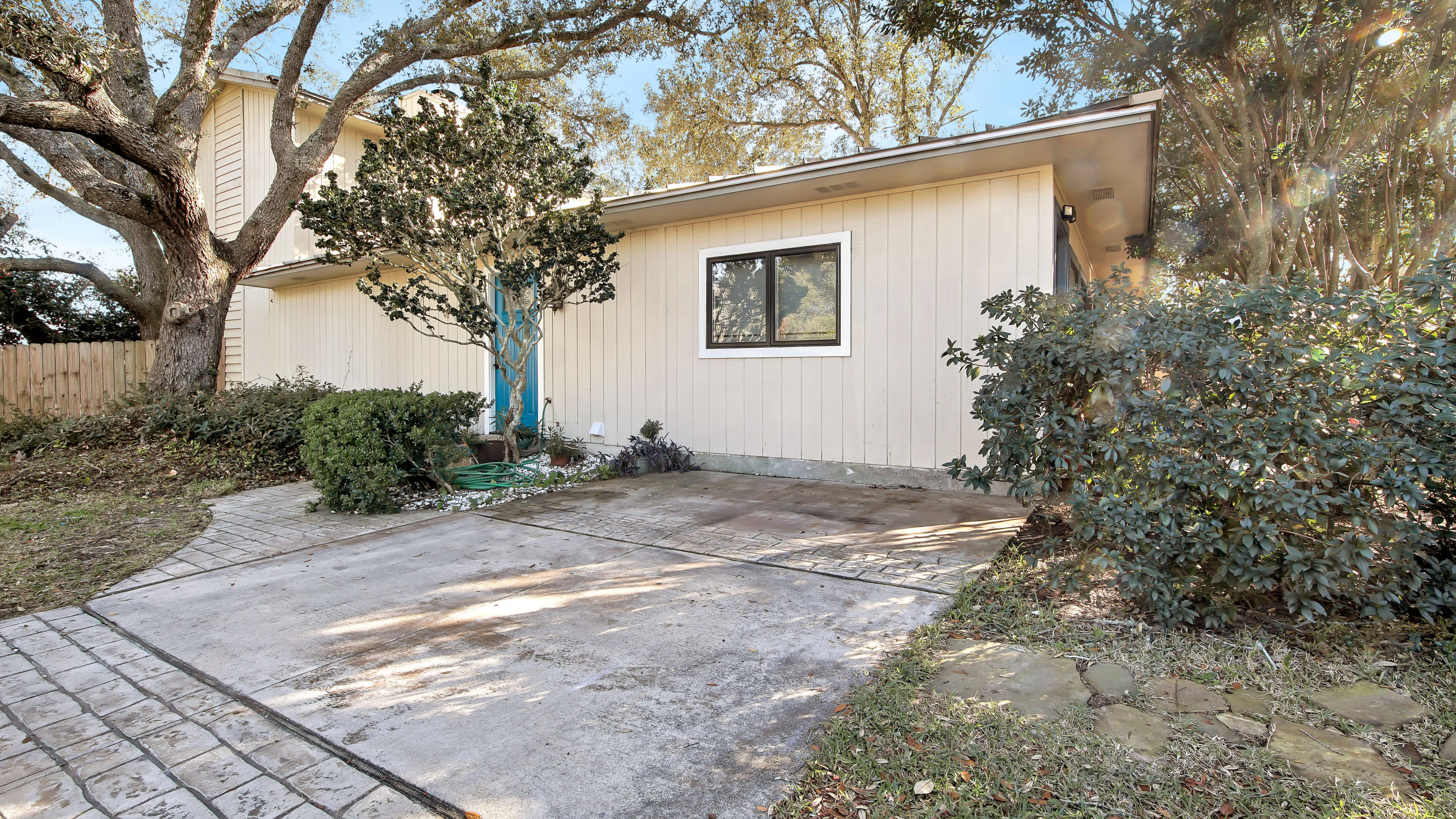 Are you looking for a home within walking distance to the beach? Corner lot (TWO LOTS) 50 x 300 located on a dead end street in the popular neighborhood of Crystal Beach. Tile flooring in the main areas of the first level. Relax in the oversized living room with a built in fire place, or continue out back onto the large open deck with plenty of room to add a pool. Three bedrooms and a full bath are located on the first floor. Make your way up the stairs to the Master Bedroom with ensuite offering a private screened in balcony overlooking the backyard. Home is not in an HOA, but the additional lot behind the home is in Kokomo Kove. Perfect for primary residence or a Short Term Rental. Sold AS-IS