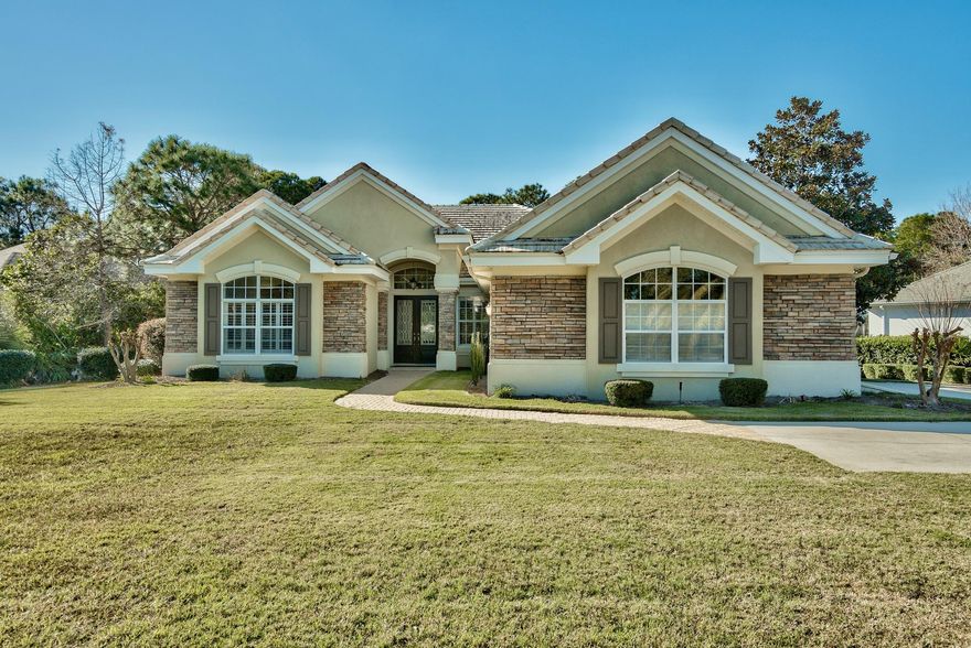 Absolutely gorgeous one-story custom home in desirable Kelly Plantation, situated on a large lot backing to the nature preserve for the utmost in privacy and just across the street from the bayou. Seller's have LOMA letter in hand, so flood insurance won't be an issue! Casually elegant and functional floorplan featuring living room, spacious and open leisure room/breakfast area/gourmet kitchen with high end stainless appliances including Subzero refrigerator, Viking gas range, wine refrigerator, abundant cabinetry and gleaming granite counters, breakfast bar and built-in desk, dining room/den (as current owners are using), a handsome study with built-ins, split bedroom floor plan with a master wing featuring a generously sized bedroom, spa-inspired bath with two vanities, large walk-in closet, additional walk-in closet, large walk-in shower, Jacuzzi tub, private water closet, two additional bedrooms with a shared bath, and a fourth bedroom and bath.  Finely appointed throughout with raised ceilings, recessed lighting, trayed ceilings, crown molding, art niches, marble vanity tops, recent hardwood floors and more!  Large screened outdoor living area, nice and private backyard with plenty of room to add a pool.  Three car garage and guest parking.   Kelly Plantation homeowners enjoy the finest of amenities including owner's club with fitness center, pool, clay tennis courts, golf clubhouse with restaurant, playgrounds, miles of walking and jogging paths, activities director, special events and more!  This beauty is a must see!  As always, all dimensions important to the buyer should be verified.  