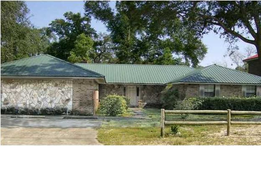 PRICE REDUCTION!!! FANTASTIC HOME, LOT OF ROOM INSIDE AND OUT - MAKE YOUR OFFER TODAY!! This beautiful all brick home, close to Eglin AFB east gate, has had alot of really nice renovations recently. All either tile floors or wood laminate flooring. Most of ceilings have been scraped, textured and repainted, bull-nose corners on most of interior sheetrock. New metal roof installed in 2003. New insulation in game room, and Workshop out back is insulated with electric. Very large property inside and out, won't last at this price long - Being sold in ''AS IS'' condition.