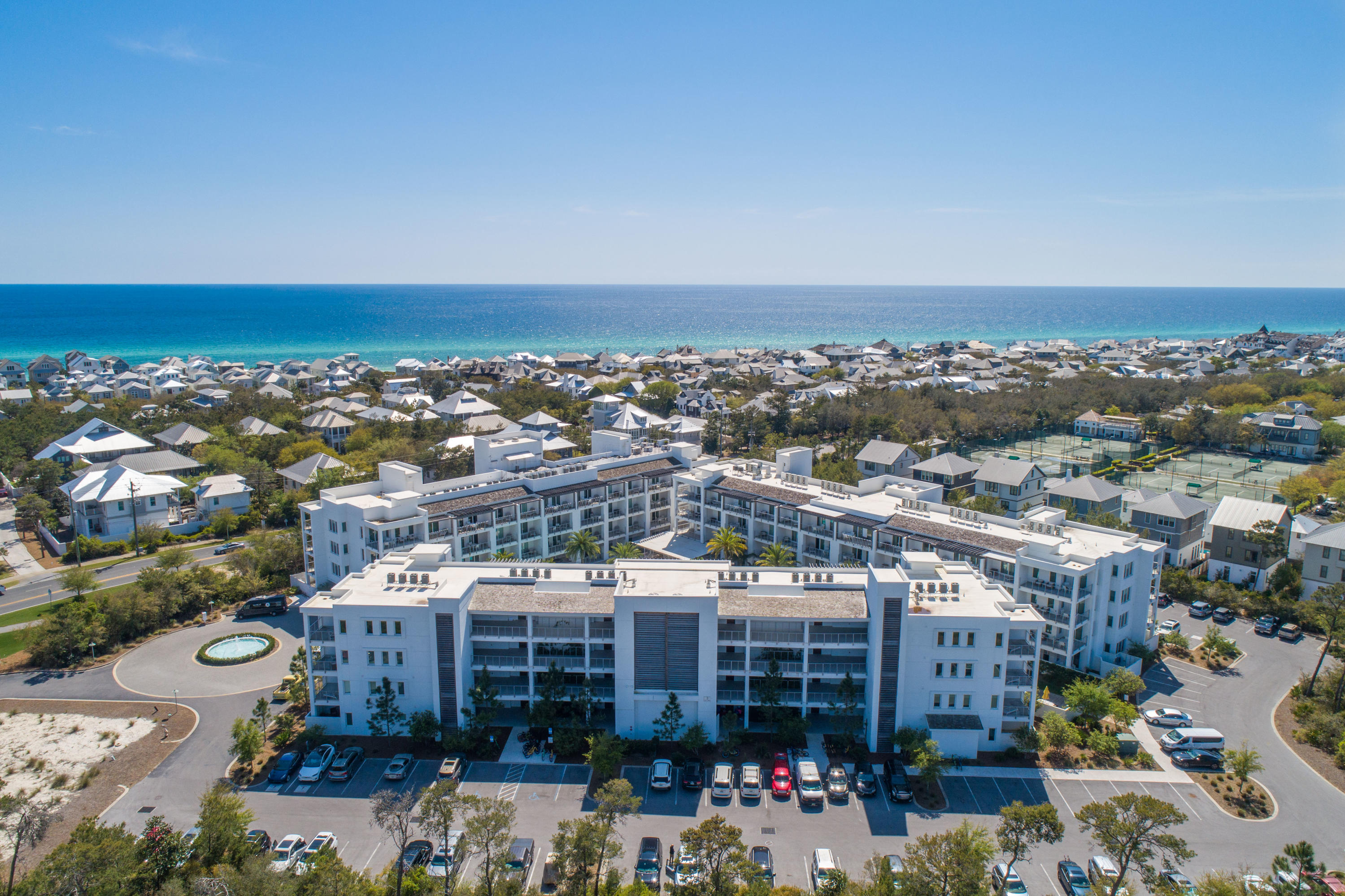 *Model Virtual Tour Available*This two-bedroom two-bathroom condo offers gorgeous views of the palm trees and cabanas around the Caribbean-style pool at this luxurious architectural award-winning resort on the east end of 30A. Directly next to Rosemary Beach, at the intersection of Hwy 98 and Hwy 30A, just across the street from the shops and dining of 30 Avenue, this is a coveted piece of real estate on 30A.