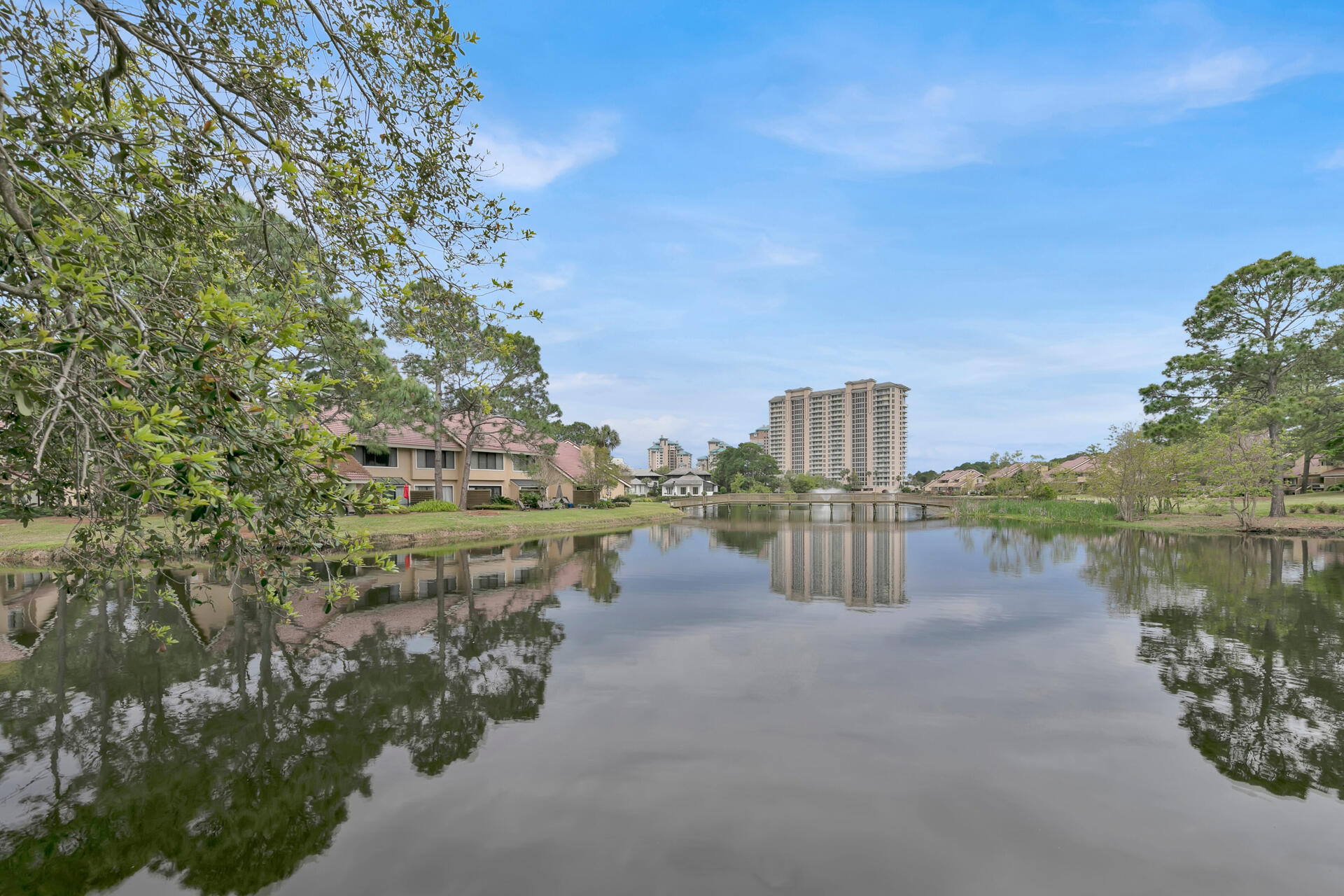 Stunning LAKEFRONT Beachwalk Villa Unit! This 2 Bedroom townhome is located on the Beachside of Sandestin! So very close to the Beach. A charming & tranquil setting. Step inside your private Courtyard entrance. 1st floor - Dining, Upgraded Kitchen, Stainless Appliances, 1/2 bath & a Spacious Living Room w/ lakefront VIEWS! Upstairs you will find the Primary Bedroom, Plantation Shutters, Lake Views & an ensuite bath. Also, a Guest Bedroom with full bath.  Sold Furnished! Sandestin is a Golf & Beach Resort Area w/ numerous neighborhoods, luxury resorts & hotels; close to miles of white-sand beaches, Baytowne Wharf, walking/ bike paths, fishing, tennis, & the Marina. Golf Cart or bike to Grand Boulevard for upscale shopping & dining.