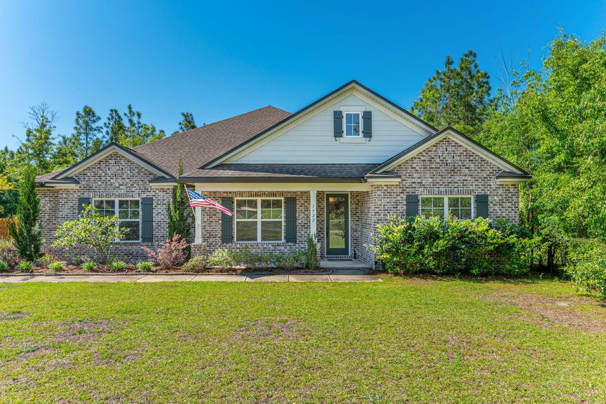 Welcome home!  Located in the highly  desirable Mill Creek Farms community, this beautiful Randy Wise home features a spacious open living area, 3 bedrooms, 3 baths and a flex room that is currently used as a 4th bedroom, but could be an office or playroom.  The home features a chef's kitchen with two islands, 8' doors, crown molding, 2.5 car garage.  Master suite features large double walk-in closets, double vanity, separate shower.  Located on over a half acre, there are porches on three sides of the home to enjoy outdoor living.  Schedule your appointment today!