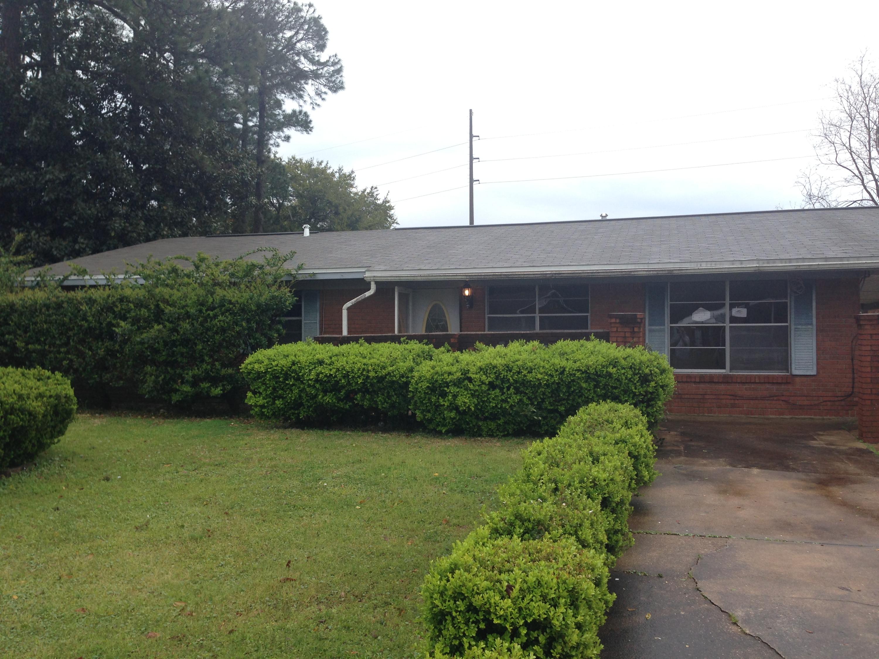 Great location close to everything. Home includes tile flooring in Kitchen and additional bath just off the kitchen. Fireplace in Den. New carpet just installed in the bedrooms along with freshly painted interior Has a workshop in backyard. Decking for a cookout in backyard too. Brick home on 1/2 acre lot.''The seller has directed that all offers on this listing must be made online via homepath.com please go to homepath.com to make an offer''