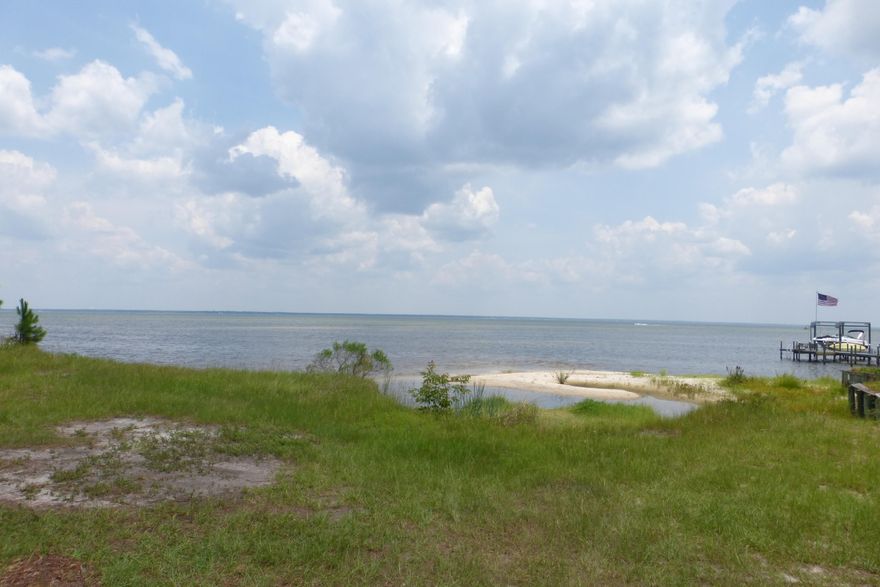 AWESOME WATER VIEWS OF BAYOU AND POOL. WATERFRONT COMPLEX.PULL UP TO YOUR UNIT ON THE FIRST FLOOR. ENJOY THE WATER VIEW OF GARNIER'S BAYOU FROM YOUR LIVING ROOM WINDOW. GREAT INVESTMENT OPPORTUNITY. TILE FLOORS THROUGHOUT. TWO BEDROOMS AND ONE FULL BATHROOM WITH FRONT AND BACK DOOR ENTRANCE. PLENTY OF PARKING AVAILABLE. WELL MAINTAINED GROUNDS, POOL, DOCK, FENCED IN AREA FOR YOUR DOGS TO PLAY, AND BOAT DOCK WITH 21 BOAT SLIPS AVAILABLE AT NO CHARGE. ON-SITE LAUNDROMAT. GROUNDS ARE BEAUTIFULLY MAINTAINED WITH NICE BBQ AREA ON THE WATER NEAR POOL. DON'T BE DISAPPOINTED ON THE PARKING LOT SIDE OF COMPLEX...THE WATER SIDE IS GORGEOUS!