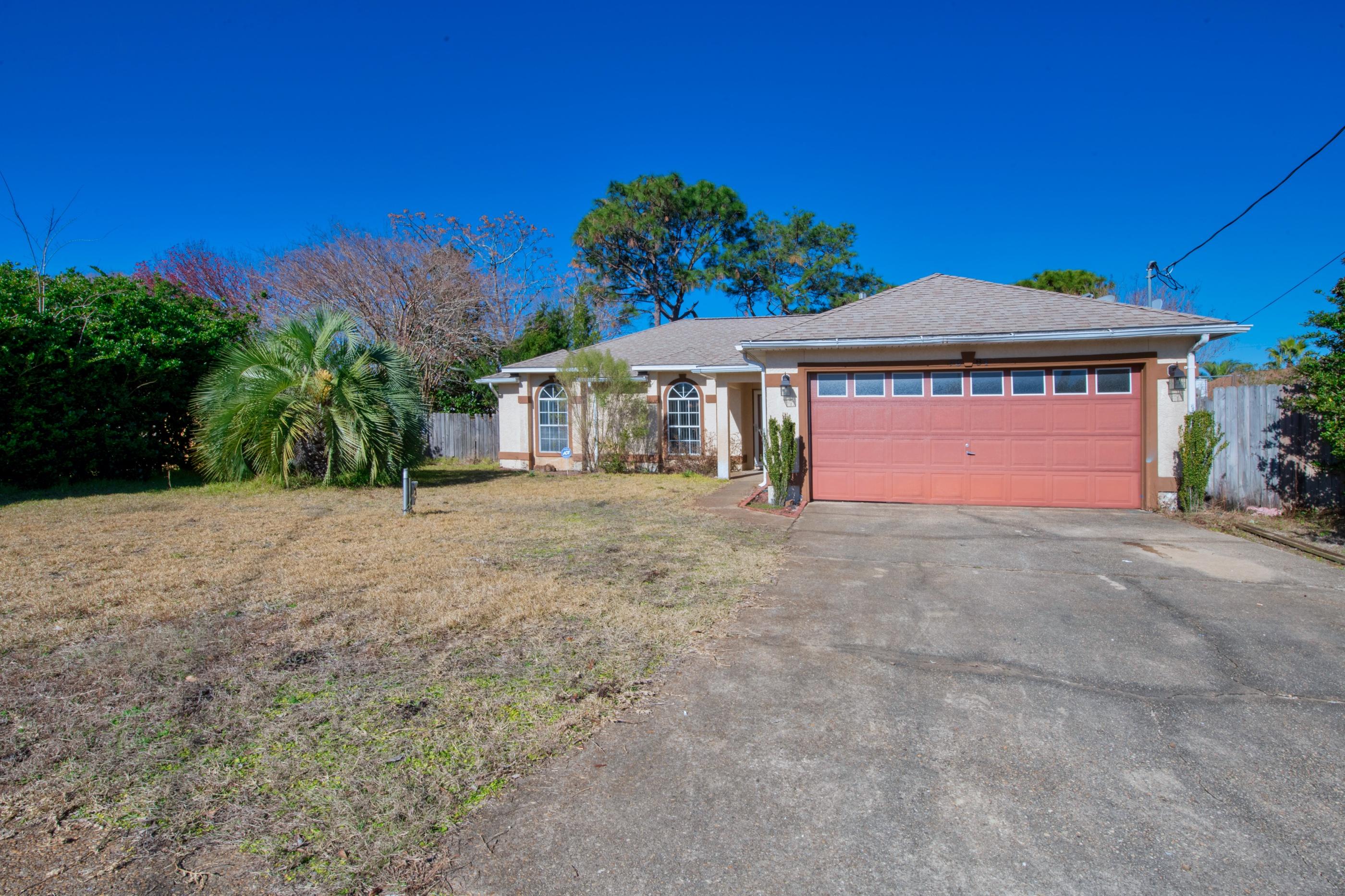 MULTIPLE OFFERS RECEIVED! Welcome to this spacious, open concept home in a quiet subdivision only 10 minutes to Hurlburt Field. Equipped with a brand new lLVP flooring and HVAC installed in November 2020, this home is vacant and ready for new owners. The kitchen features plenty of cabinetry and overlooks the large living area with fireplace and vaulted ceilings.The split bedroom floor plan offers distance and privacy between the master suite and the two additional bedrooms. The master suite features a 5 piece bathroom with seperate soaking tub, dual vanities, and walk in closet with organizer system.The Florida room off of the back yard would make an excellent home gym, office or playroom. The large yard is fully fenced and features a storage shed.