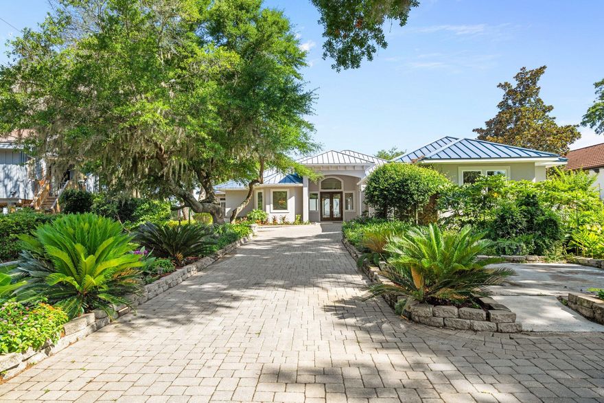 Imagine ending every day with the sun setting over Choctawhatchee Bay, the water calm, the breeze light, and your boat waiting at the dock just steps from your back door. This is the kind of home that instantly feels like a getaway--yet keeps you close to everything Destin has to offer.Set on a rare .85-acre waterfront lot, this 4-bedroom, 2.5-bath home offers space, privacy, and a true connection to the water. Built in 2012, the 3,091-square-foot home was thoughtfully designed with hurricane-resistant ICF construction and quality upgrades that make it feel solid, comfortable, and built to last. The 3-car garage easily handles vehicles, storage, and all your coastal gear.Life here naturally flows outdoors. From the backyard, you'll enjoy sweeping bay views, a private boat dock for effortless days on the water, and a screened-in, heated pool that's perfect year-roundwhether you're hosting friends or enjoying a quiet evening under the stars. Mature trees provide shade and character, while new low-maintenance landscaping with synthetic turf keeps the yard beautiful without constant upkeep.

This home is as practical as it is peaceful, featuring a geothermal HVAC system (2022) for energy efficiency and a Generac full-house generator for added peace of mind. The property is gated and fenced, offers RV parking, and has no HOAgiving you flexibility that's increasingly hard to find in Destin.

Best of all, you're right where you want to be. Just one mile from Destin Harbor's dining and shopping, one mile to the public boat ramp, less than a mile to iconic Crab Island, and only 10 minutes to Destin Executive Airport. You're close to the action, yet tucked into your own private waterfront retreat.

This isn't just a homeit's a lifestyle, and it's ready to be enjoyed.