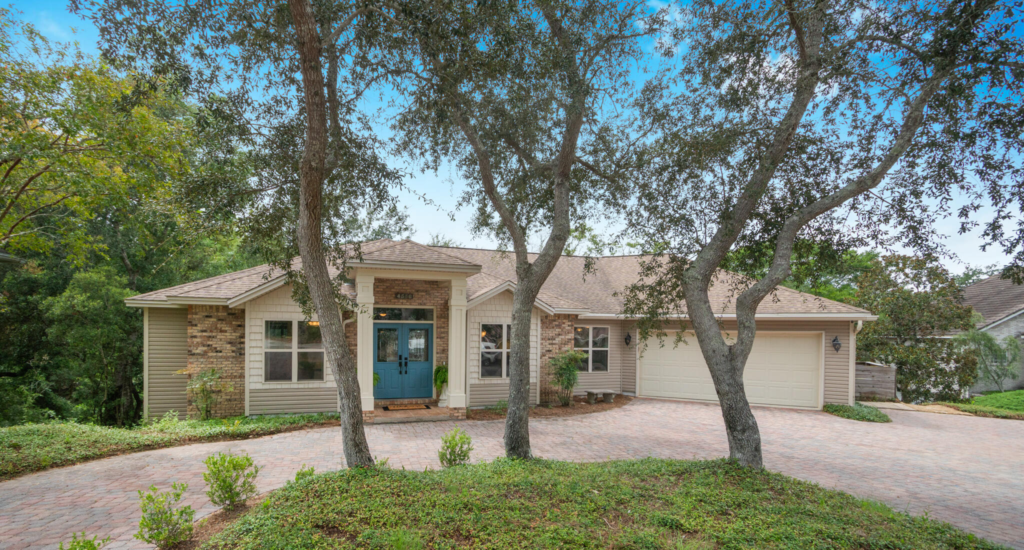 Price Drop!! Magnificent two-story residence, located in the prestigious gated community of Parkwood Estates, offers 5 bed & 3.5 baths, providing ample space & luxury. The community also features a private gate for convenient drop-off and pick-up at Bluewater Elementary. As you step inside, you're greeted by the living room on the first floor, featuring a cozy gas fireplace, hardwood flooring, and 10' ceilings. The kitchen is a chef's paradise, boasting plenty of cabinetry, a larger refrigerator, & plenty of counter space. The master suite, being the only bedroom on this level, offers privacy and tranquility. Its spacious layout and luxurious en-suite bath ensure a perfect retreat for relaxation.Downstairs you will find a vast great room complete with a convenient kitchenette, perfe for gatherings and entertaining. This level also includes four generously sized bedrooms and two full baths, offering privacy and comfort for family and guests.
Step outside to your private oasis overseeing the lake and enjoy your pool and a tranquil screened-in porch. Pool is chlorine but can be returned to a salt water pool. AC units were replace in 2022 and save on energy costs with roof spray insulation. This extraordinary home is a true gem that must be seen to be fully appreciated.