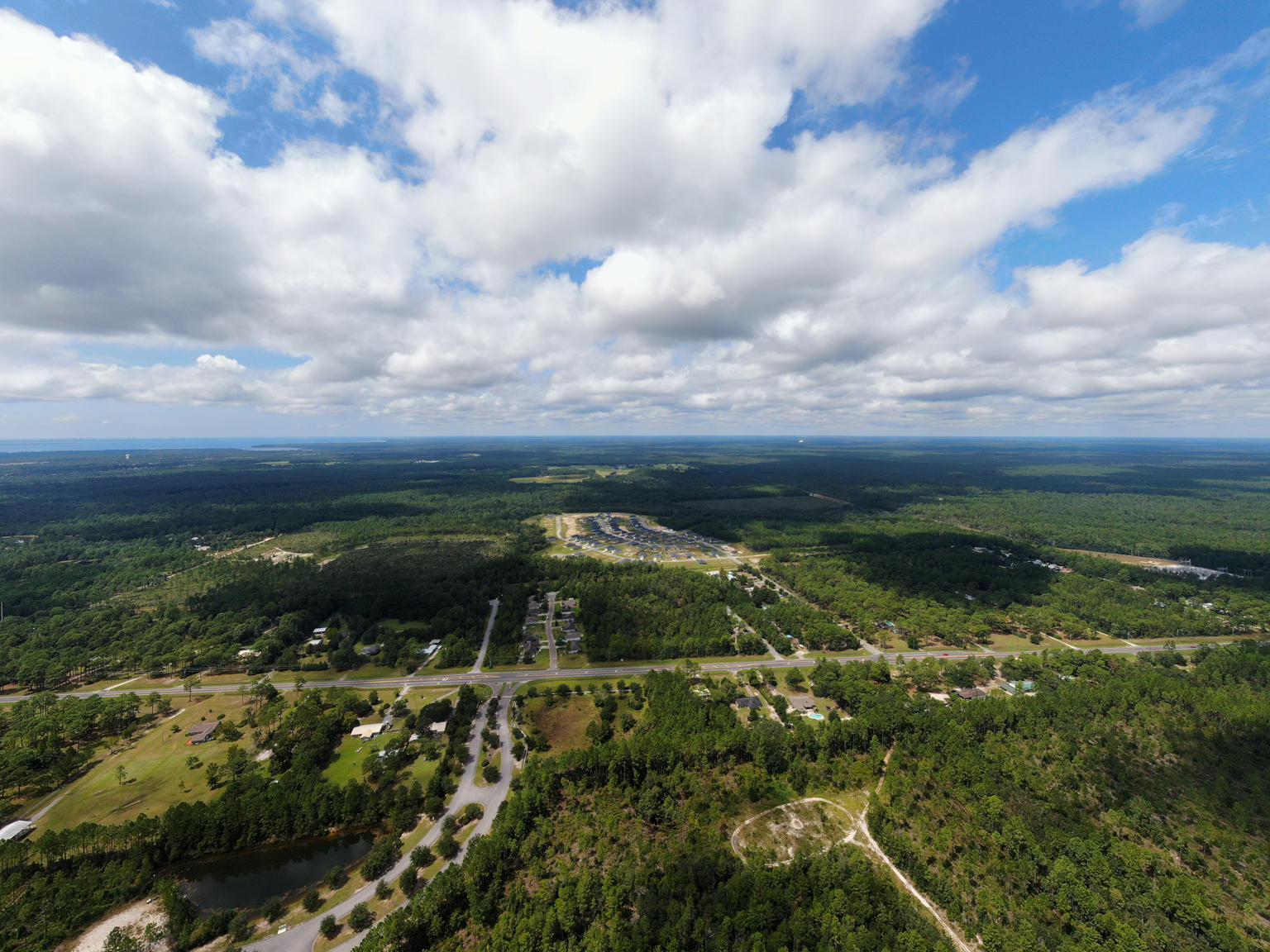 Rare opportunity to purchase 211+/- acre tract in the city of Freeport just off 331 Business. Currently zoned RV Rural Village.Contiguous to R-3 high density & Cross Creek Estates. Survey available.