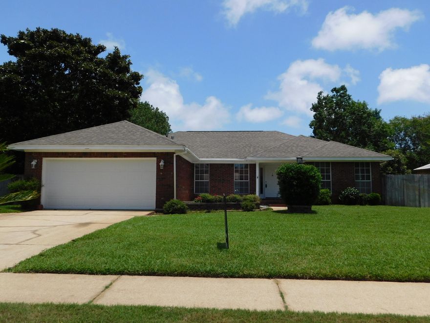 Now, Easy to View! Pool Home with Large Yard! Fabulous Location! Convenient to Military Bases, Shopping and Beaches! This immaculate home has been lovingly cared for and has a wonderful, functional floor plan. It is on a large lot and is located on a quiet cul-de-sac that backs to the Eglin Reservation. This fabulous home has a split floor plan design. The Kitchen has Solid Surface Counter tops, Tile Flooring and updated appliances! The Bedrooms are generously sized and there is an inside utility room for laundry. The Master Bath is open and has Two Sinks, a Separate Shower, a Bathtub and a walk-in closet! The neighborhood has underground utilities which means you are more likely to not lose power during a storm! The Privacy Fenced yard has a GORGEOUS In-Ground Pool