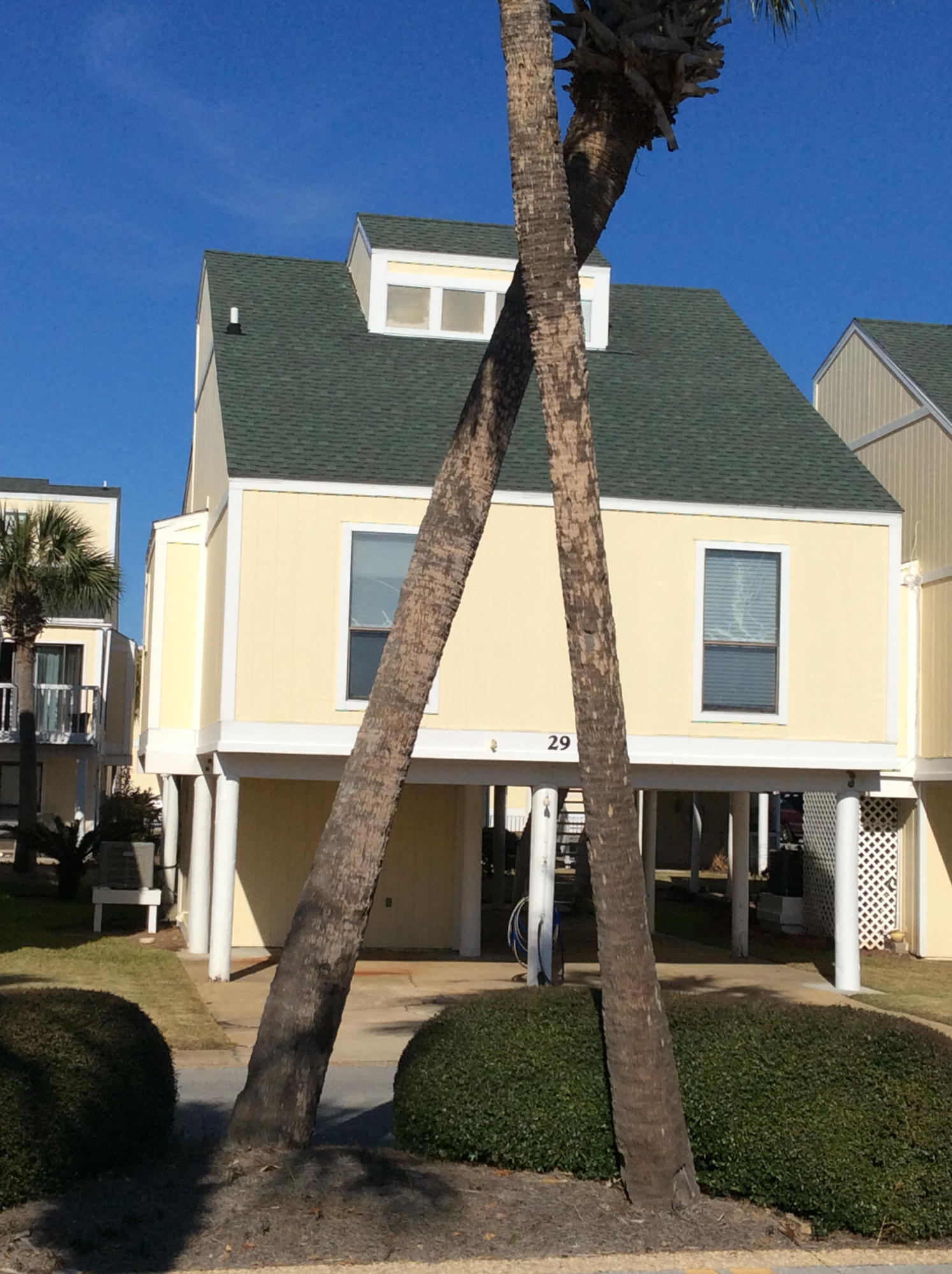 Super ''cottage'' style free standing condominium centrally located in Sandpiper Cove. Great sq footage for full time residency,second home or rental property. Large open entertaining areas beginning with the ground level covered patio. Also has large laundry/storage room on the ground level,perfect for storing beach chairs & umbrellas, bikes etc. Extra parking for this condo(4 vehicles)& great for golf carts etc. Main floor has living, dining kitchen, two guest bdrms & 1bath. The large lv.rm. features high vaulted ceilings. The entire top floor is the master suite w/vaulted ceilings, separate vanity area, bath,and large walk-in closet. SPC is a medium density residential style resort occupying 43 acres in the heart of downtown Destin. Favorite amenities include 1100 ft of beachfront,5 po