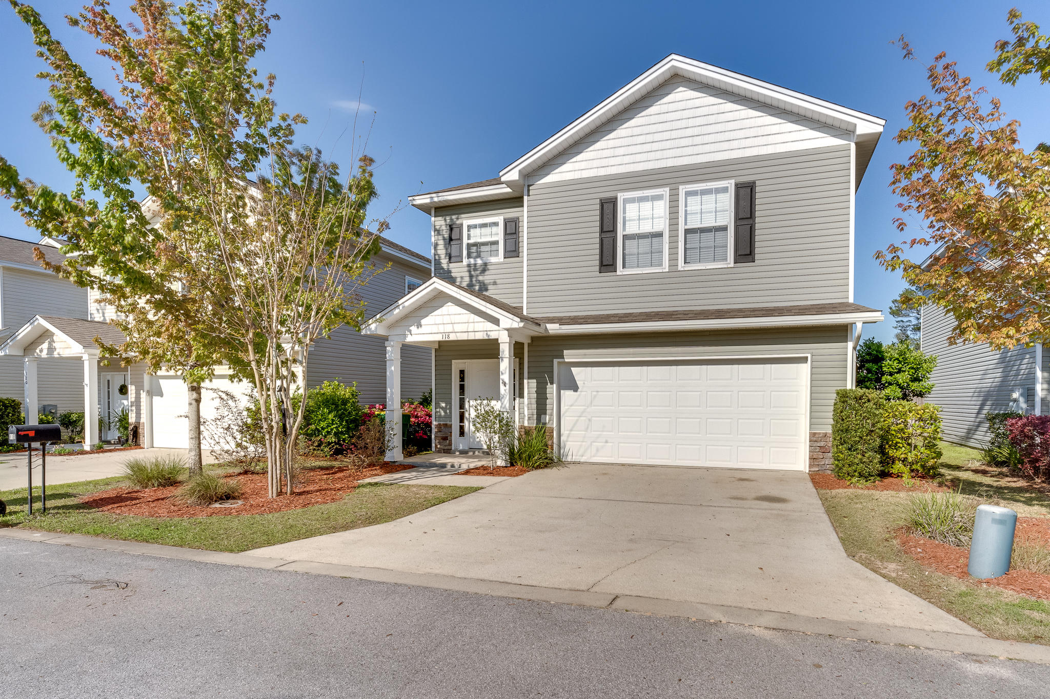 Highest & Best offers! Need a like-new home that is close to shopping and schools, then take a look at this 4 bedroom, 2 and a half bath home with granite counters in the kitchen and a 2 car garage! Your kitchen is open to the living room and offers breakfast bar on two sides, stainless steel appliances, and dining area! This home offers a great design with 9 ft ceilings, crown molding, and accent lighting within the shelving, above the kitchen cabinets. You have an electric fireplace, which has the aesthetics, heat, and beauty you want, without dragging logs into the home. The lighter granite countertops & walls compliment the darker hardwood custom cabinetry and floors. You will be among family and guests in this open kitchen, dining, and living room areas! The master bedroom is spacious