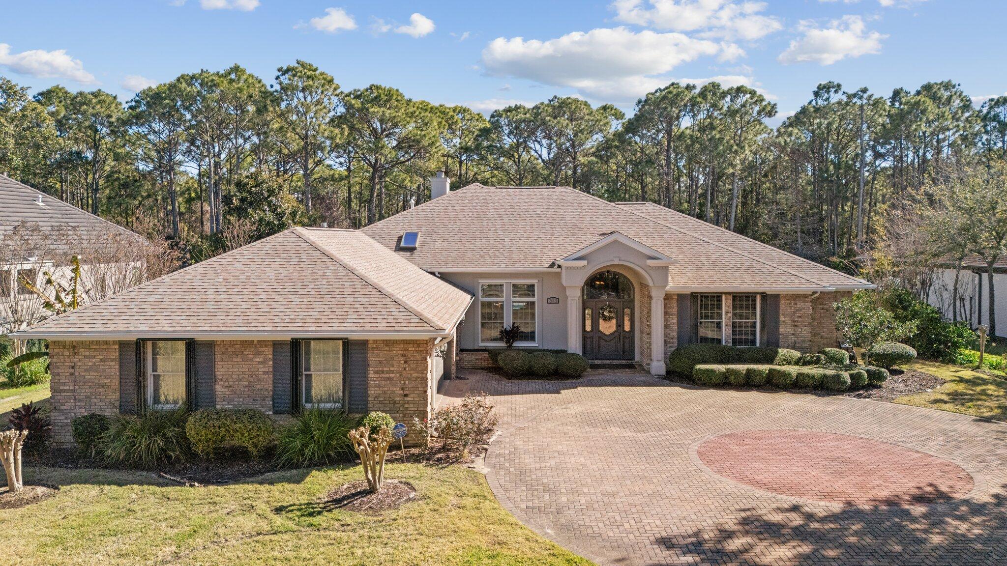 Located in the prestigious Kelly Plantation, the most sought-after subdivision in Destin, this stunning, completely remodeled single-story luxury home offers 3 bedrooms, 3 full bathrooms, and 1 half bathrooms. As you arrive, a circular driveway welcomes you to the arched entryway. Inside, floor-to-ceiling windows span the back of the home, flooding the space with natural light and offering breathtaking views of the enclosed pool area from both the main living area and the master bedroom. The open-concept living area features brand-new tile flooring throughout, complementing the dream kitchen, which boasts floating shelves, a striking white backsplash contrasted with dark copper and natural wood accents, a five-burner gas stove with a double oven, concrete countertops, and a farmhouse sink. The butler's pantry provides additional cabinet space and storage, making this kitchen perfect for entertaining and culinary enthusiasts alike.

Throughout the home, unique design touches create a warm and inviting atmosphere. The living room is highlighted by large barn doors crafted from repurposed wood that match the oversized wall clock, adding a rustic yet modern charm. The master suite offers a private retreat with a cozy gas fireplace and a newly renovated spa-like bathroom, featuring custom cabinetry with double vanities, a large zero-entry marble walk-in shower, and an expansive walk-in closet with floor-to-ceiling shelving for ample storage. A private entry leads directly from the master bedroom to the pool area, where a hot tub awaits just steps away. The guest bedroom at the front of the home includes its own walk-in closet and private full bathroom, ensuring privacy and comfort for visitors. Additionally, there is a half bathroom located conveniently  near the main entry and another full bathroom with a standing shower right off the kitchen leading to the garage. This is great for when you are returning from the beach and have guests.  Then there is a separate laundry room with a folding station off the butler's pantry too. 

The exterior of this home is just as impressive, featuring a saltwater pool with a gas-fired pool heater installed in 2022, fresh plastering, rescreening, and newly painted pool and fence areas. Hurricane shutters provide peace of mind, while the spacious 2-car garage and circular driveway offer ample parking for up to 6 additional vehicles. The home is equipped with an irrigation system that utilizes recycled water, helping to reduce utility costs.

Additional upgrades include a 2022 HVAC system, a 2017 roof, fresh interior paint in 2025, and gas connections throughout the house for the stove, hot water heater, grill, and fireplace. The stucco and trim were also freshly painted in 2021, ensuring the home's exterior remains in pristine condition. This meticulously updated home combines luxury, functionality, and timeless design in one of Destin's most exclusive communities.

Living in Kelly Plantation offers residents an exceptional lifestyle enriched by a wide range of exclusive amenities designed to enhance comfort, recreation, and community engagement. At the heart of the community is the 2,000-square-foot Owners Club, featuring restrooms, a covered deck with grilling facilities, and a spacious 75,000-gallon pool with a sun deck perfect for relaxation and social gatherings. For families, the community playground provides a safe and enjoyable space for children to play and connect.

Fitness enthusiasts will appreciate the state-of-the-art fitness center, which includes a well-equipped weight room with a variety of training and cardiovascular machines, an aerobics and yoga room, and convenient amenities such as restrooms, an ice machine, and parking for up to 15 cars. Tennis lovers can take advantage of five LED-lighted clay tennis courts, complete with shaded benches, tables, restrooms, and a water bottle refill station. The courts are well-maintained with tennis two-step grooming brushes, ensuring an optimal playing experience.

Kelly Plantation also offers an impressive array of sports facilities, parks, and trails to promote an active and social lifestyle. Residents can enjoy four pickleball courts, a hard-surface tennis court, a basketball court, and fields for softball and volleyball. The community also features a dedicated dog park for furry family members and a scenic nature trail, providing a perfect setting for walking, jogging, or simply enjoying the natural surroundings. With these top-tier amenities, Kelly Plantation fosters a vibrant, active, and family-friendly environment, making it an ideal place to call home.
