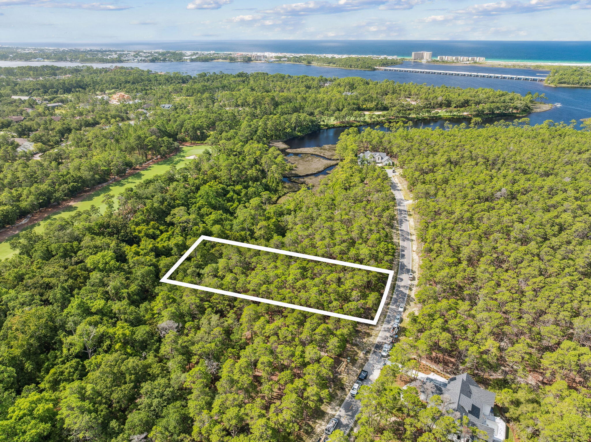 Gorgeous wooded lot located towards the end of a cul-de-sac in the gated neighborhood of Wild Heron, a true coastal sanctuary in the Florida panhandle. Situated in the back of the neighborhood for added privacy, you can enjoy an abundance of wildlife. Build your dream home on a little over a HALF ACRE. Wild Heron is an amazing community providing loads of amenities: community pool, playground, fitness center, dock and more; located on the largest Coastal Dune Lake Powell. 30A and Pier Park are about 10 minutes away so access to shopping, restaurants etc are very convenient. The Watersound Sharks Tooth Golf Course can be enjoyed upon joining the Watersound Club membership.