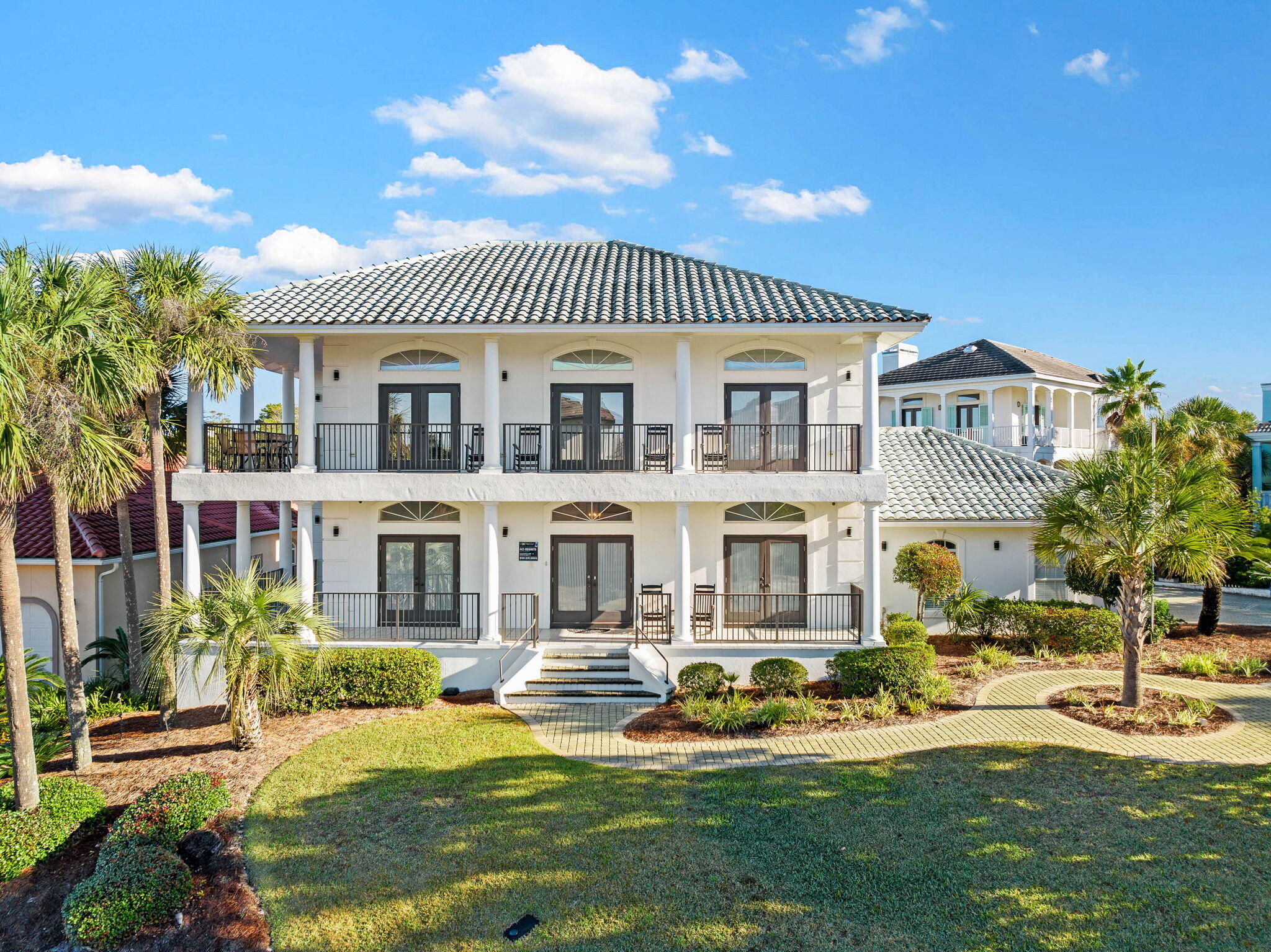 Perfectly positioned in the exclusive gated community of Destiny East, this exquisite two-story home offers a seamless blend of coastal elegance and modern functionality. The thoughtfully designed five-bedroom layout provides an open and inviting atmosphere, with light-filled interiors and effortless transitions to the outdoors. Every detail has been curated to enhance both comfort and style, making this property a standout in one of Destin's most coveted neighborhoods. The heart of the home is its second-floor living area, where an open-concept design connects the spacious living room, dining area, and gourmet kitchen. Premium finishes and generous spaces create an ideal setting for both entertaining and quiet family moments. The owner's suite, also on this level, features a private balcony and spa-like ensuite bath, offering a tranquil retreat from the day's activities.

On the first floor, two king master suites with private baths provide comfort and privacy, while additional bedrooms are perfectly suited for family or guests. Practical elements, such as a large garage with an extra refrigerator and a fully equipped laundry room, ensure convenience without compromising on luxury.

The outdoor space is a true highlight, centered around a custom-designed pool and spa. With spillovers, a tanning ledge, integrated seating, and a spacious lounging area, this private oasis is perfectly suited for relaxation and entertaining. The attention to detail extends to every corner of this outdoor retreat, making it a natural extension of the home's refined interior.

Destiny East offers residents access to unparalleled amenities, including a fitness center, sports courts, and a private movie theater, all within a short distance of the home. With close proximity to James Lee Park and its pristine beaches, this property delivers the quintessential Destin lifestyle.

Contact us today for cost-to-own figures & rental projections. 