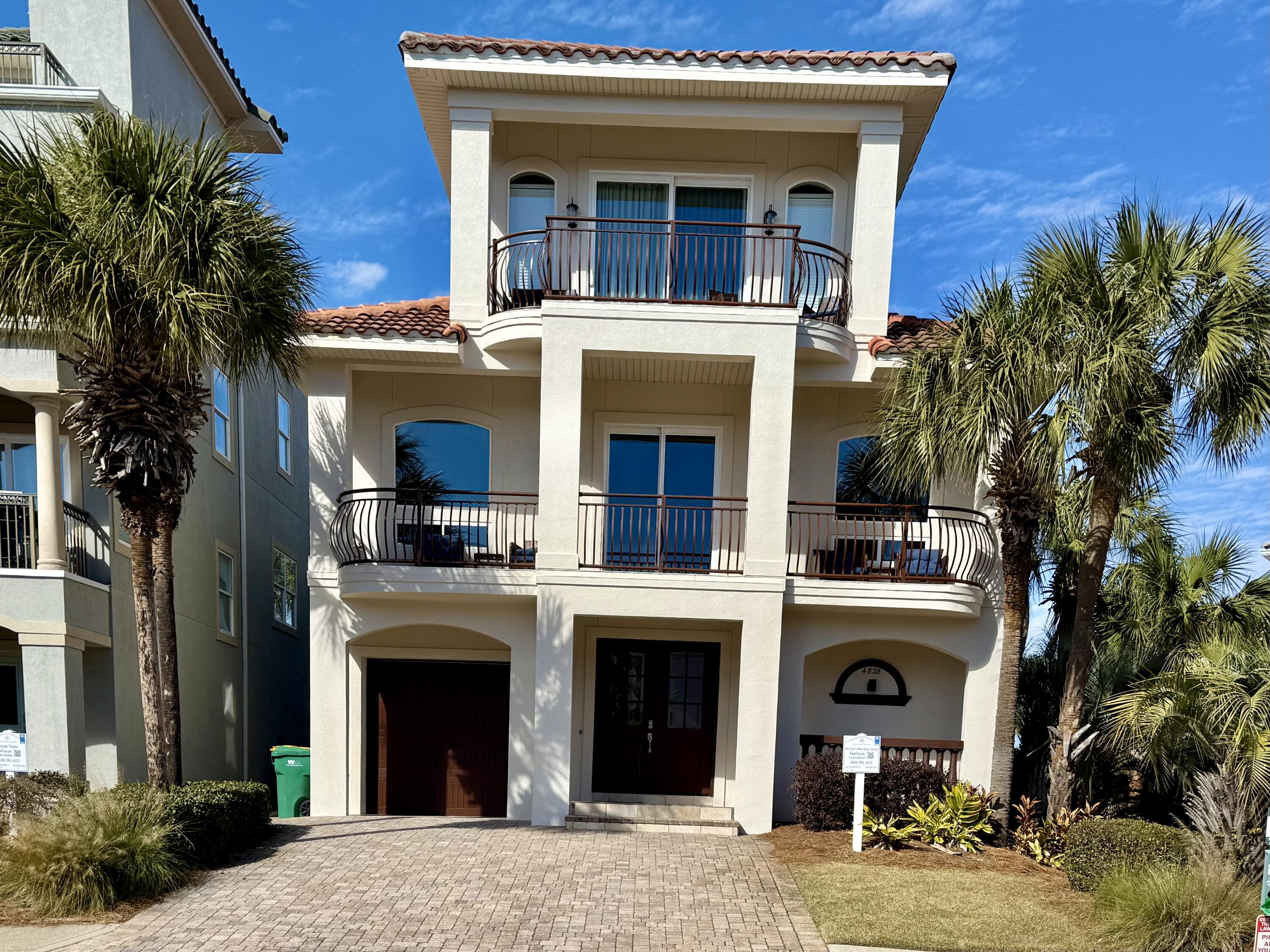 Just painted entire outside of home. Indulge in a seamless coastal lifestyle from this recently updated furnished 4BR/4BA gulf view beach retreat in the coveted gated community of Destiny by the Sea. Private DEEDED BEACH ACCESS. A Mediterranean-style exterior with classic architectural details such as a tiled roof, curved balconies, and arched entryways and windows invokes a feeling of being on an endless tropical vacation. Step through the mahogany double doors to reveal impeccably maintained spaces with neutral wall colors highlighted by beautiful millwork and ceramic plank flooring designed to offer the natural allure of wood without the maintenance. A reverse floor plan maximizes peekaboo views of the Gulf of Mexico from both the second and third floor balconies. Perfect for entertaining, the second level living and dining spaces provide ample room to host and relax. The kitchen features both a prep island and a breakfast bar, quartz countertops, a subway tile backsplash, and stainless steel appliances. A bunk room and bathroom are also located on this level while two guest rooms with ensuite bathrooms and a game room are on the first level. Ascend to the third floor where the spacious and serene master bedroom suite offers its own private balcony. Outside, enjoy a private backyard and large veranda with hanging bed swing.
Centrally located to all of the attractions of the Emerald Coast, Destiny by the Sea offers gated entry, neighborhood beach access, and a community pool. This property is a must-see for buyers seeking a turnkey investment property or personal haven!