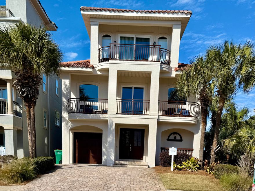 Just painted entire outside of home. Indulge in a seamless coastal lifestyle from this recently updated furnished 4BR/4BA gulf view beach retreat in the coveted gated community of Destiny by the Sea. Private DEEDED BEACH ACCESS. A Mediterranean-style exterior with classic architectural details such as a tiled roof, curved balconies, and arched entryways and windows invokes a feeling of being on an endless tropical vacation. Step through the mahogany double doors to reveal impeccably maintained spaces with neutral wall colors highlighted by beautiful millwork and ceramic plank flooring designed to offer the natural allure of wood without the maintenance. A reverse floor plan maximizes peekaboo views of the Gulf of Mexico from both the second and third floor balconies. Perfect for entertaining, the second level living and dining spaces provide ample room to host and relax. The kitchen features both a prep island and a breakfast bar, quartz countertops, a subway tile backsplash, and stainless steel appliances. A bunk room and bathroom are also located on this level while two guest rooms with ensuite bathrooms and a game room are on the first level. Ascend to the third floor where the spacious and serene master bedroom suite offers its own private balcony. Outside, enjoy a private backyard and large veranda with hanging bed swing.

Centrally located to all of the attractions of the Emerald Coast, Destiny by the Sea offers gated entry, neighborhood beach access, and a community pool. This property is a must-see for buyers seeking a turnkey investment property or personal haven!