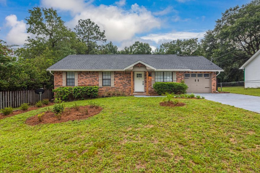 Move in ready fully remodeled 3 bedroom 2 bath home including brand new roof and HVAC system. The seller spared no expense completely updating the home with stunning LVP flooring, updated vanities in the bathrooms, fixtures throughout and a stunning kitchen boasting ample cabinets and granite counter space as well as new stainless steel appliances to meet all your cooking needs. There is also a custom moveable kitchen island for additional seating and cooking space . Master bath is spacious and boasts a walk in shower. Large master suite to fit all your bedroom furniture. Step out onto the newly replaced composite decking where you can enjoy the morning coffee. Large spacious backyard with 2 yard buildings. Plenty of room to store a boat or camper as well. Schedule your showing